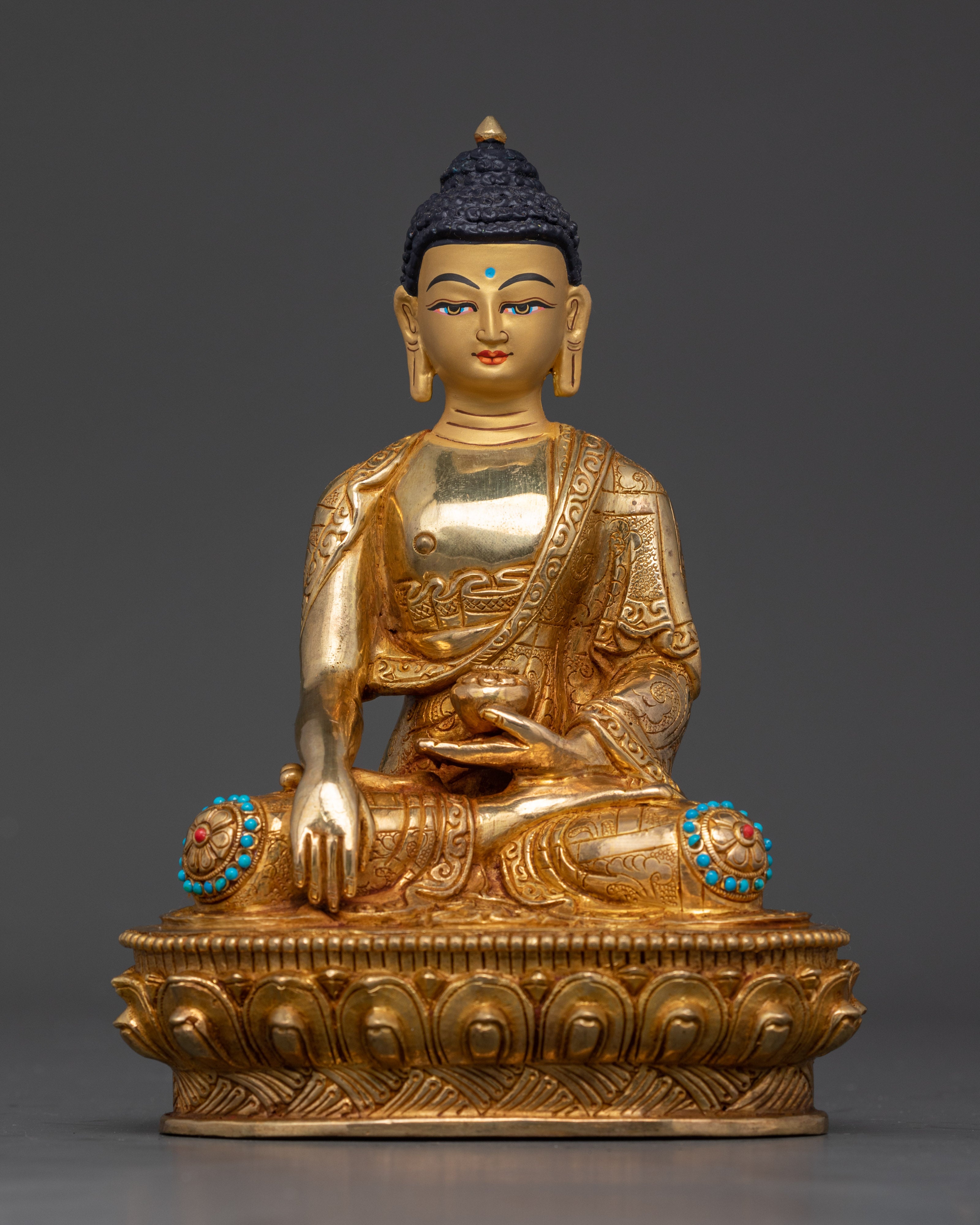 Handcrafted Sakyamuni Buddha statue with 24K gold face on lotus pedestal