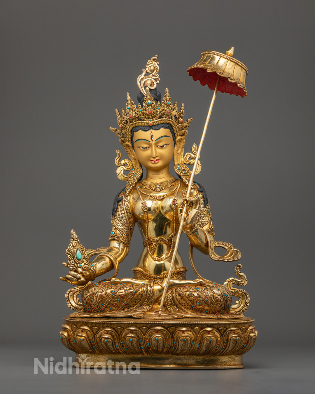 Handcrafted Sitatapatra Statue’s 24K gold-gilded face and gold fire-gilded body with semi-precious stones