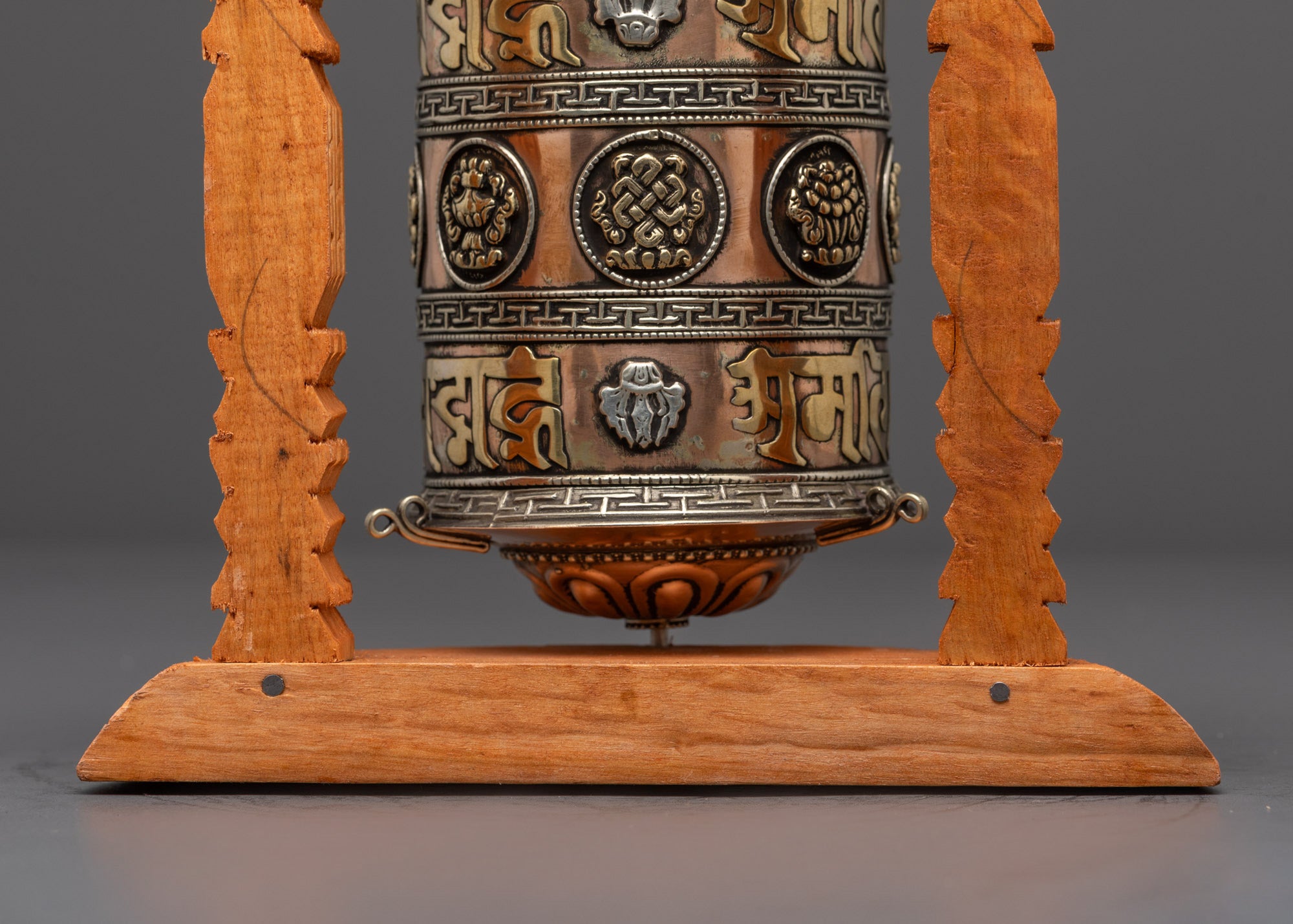 Handcrafted Tibetan Mantra Prayer Wheel with detailed wooden frame and spiritual engravings