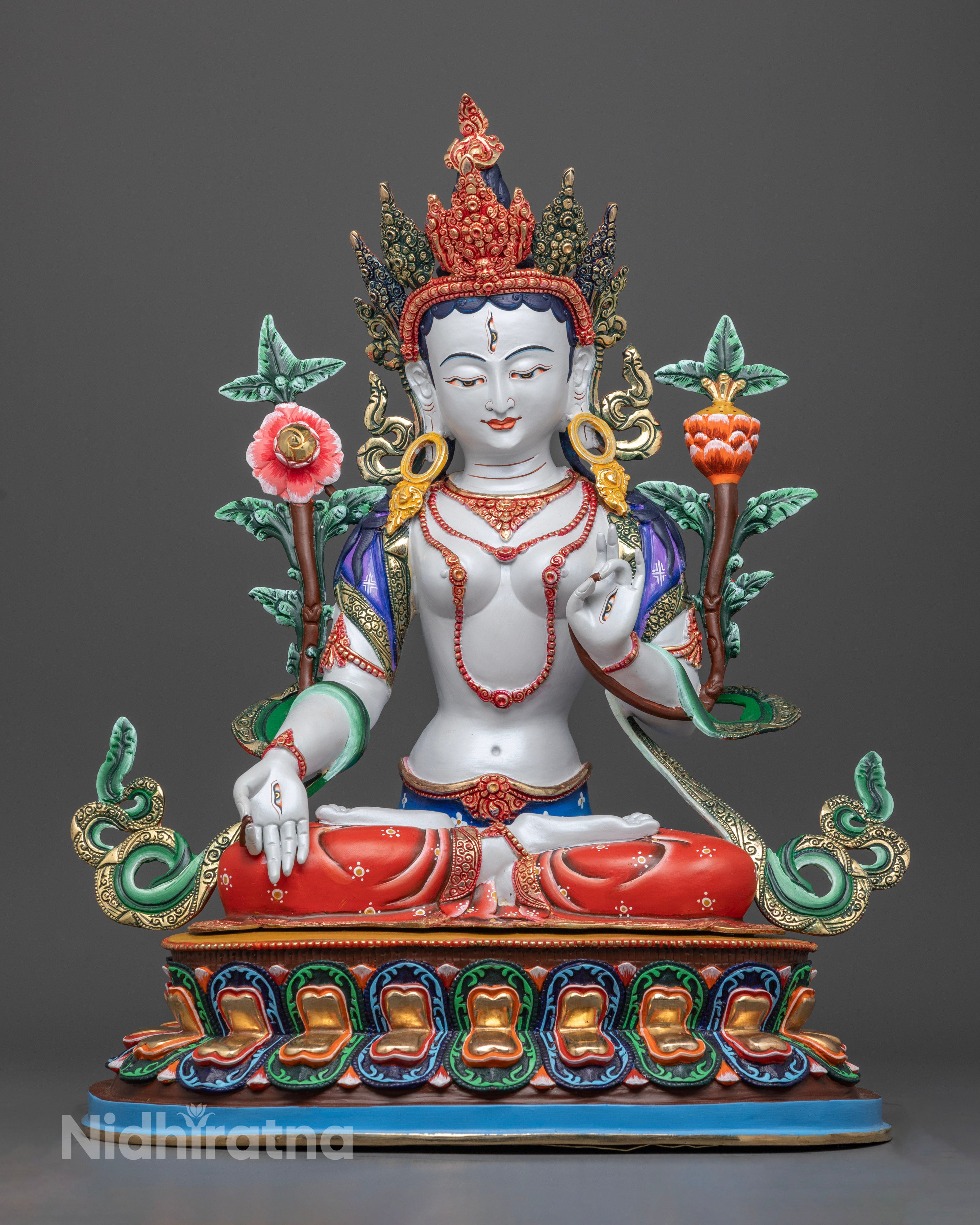 Handcrafted White Tara statue from Patan, Nepal, made of high-quality copper with vibrant acrylic colors, standing 46cm tall and 37cm wide, showcasing intricate traditional detailing.
