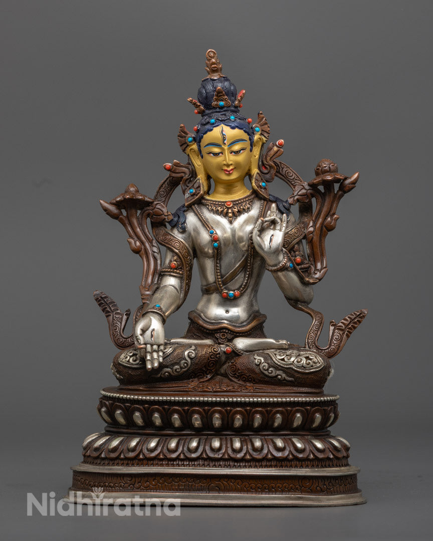 Handcrafted White Tara statue with 24k gold-gilded face and silver-plated copper body, seated on a lotus throne