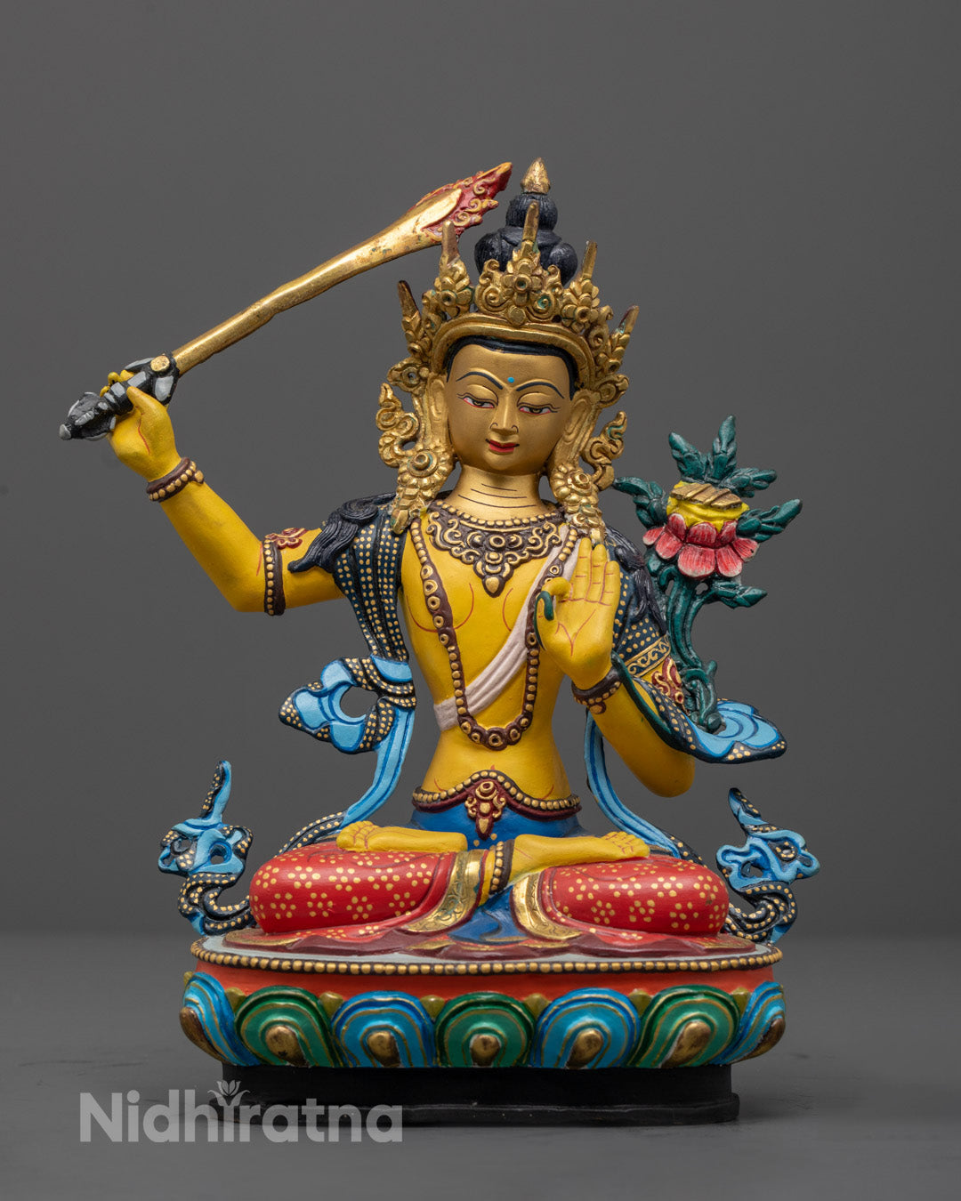 Handcrafted Yellow-Hued Manjushri Statue with Gold-Gilded Face and Utpala Flower