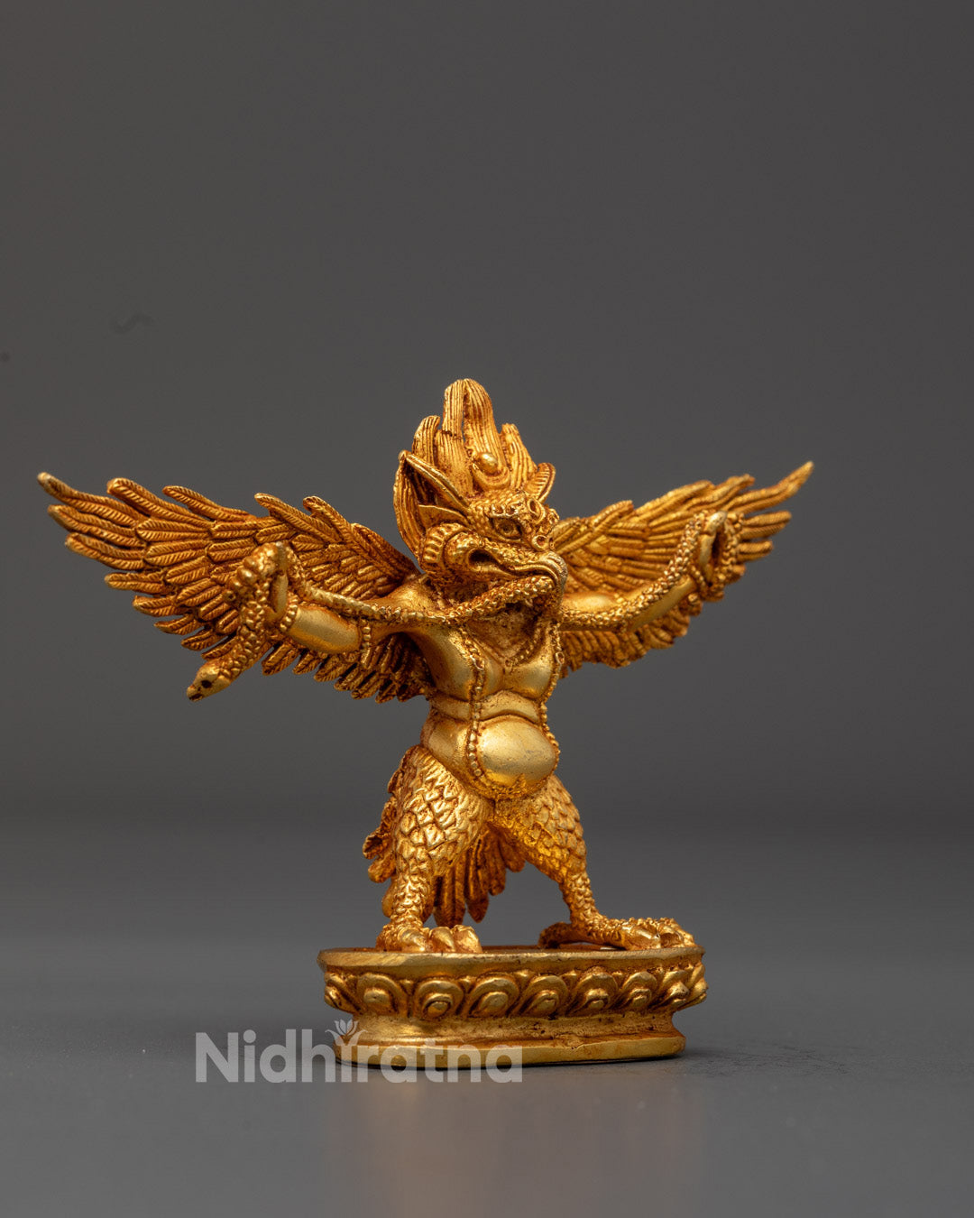 Handmade Garuda statue symbolizing strength and spiritual freedom, serving as the mount of Lord Vishnu and protector against evil