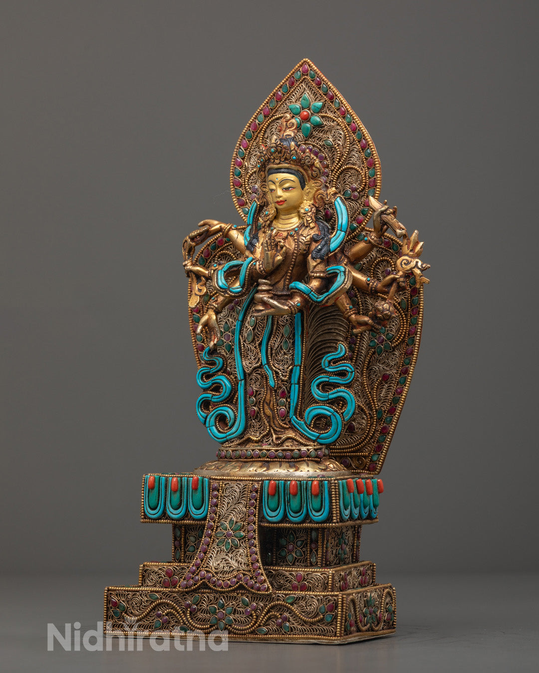Intricately carved halo and throne of the Majestic Chenrezig Statue, richly decorated with gemstones and symbolic Buddhist motifs for spiritual spaces.