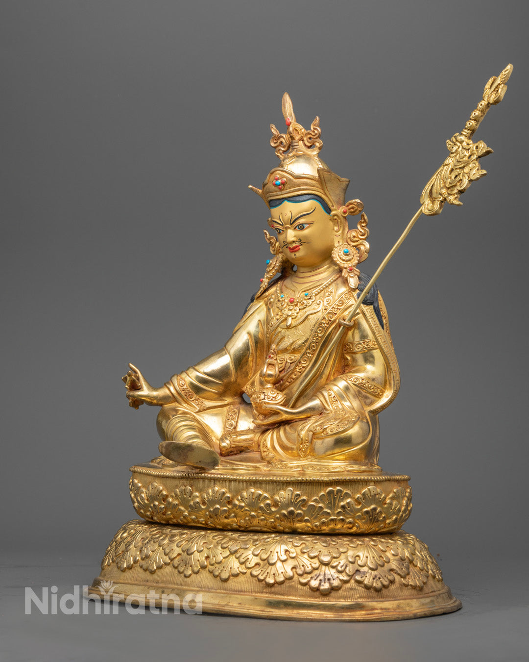 Intricately detailed Padmasambhava statue featuring traditional lost wax craftsmanship and sacred Buddhist iconography