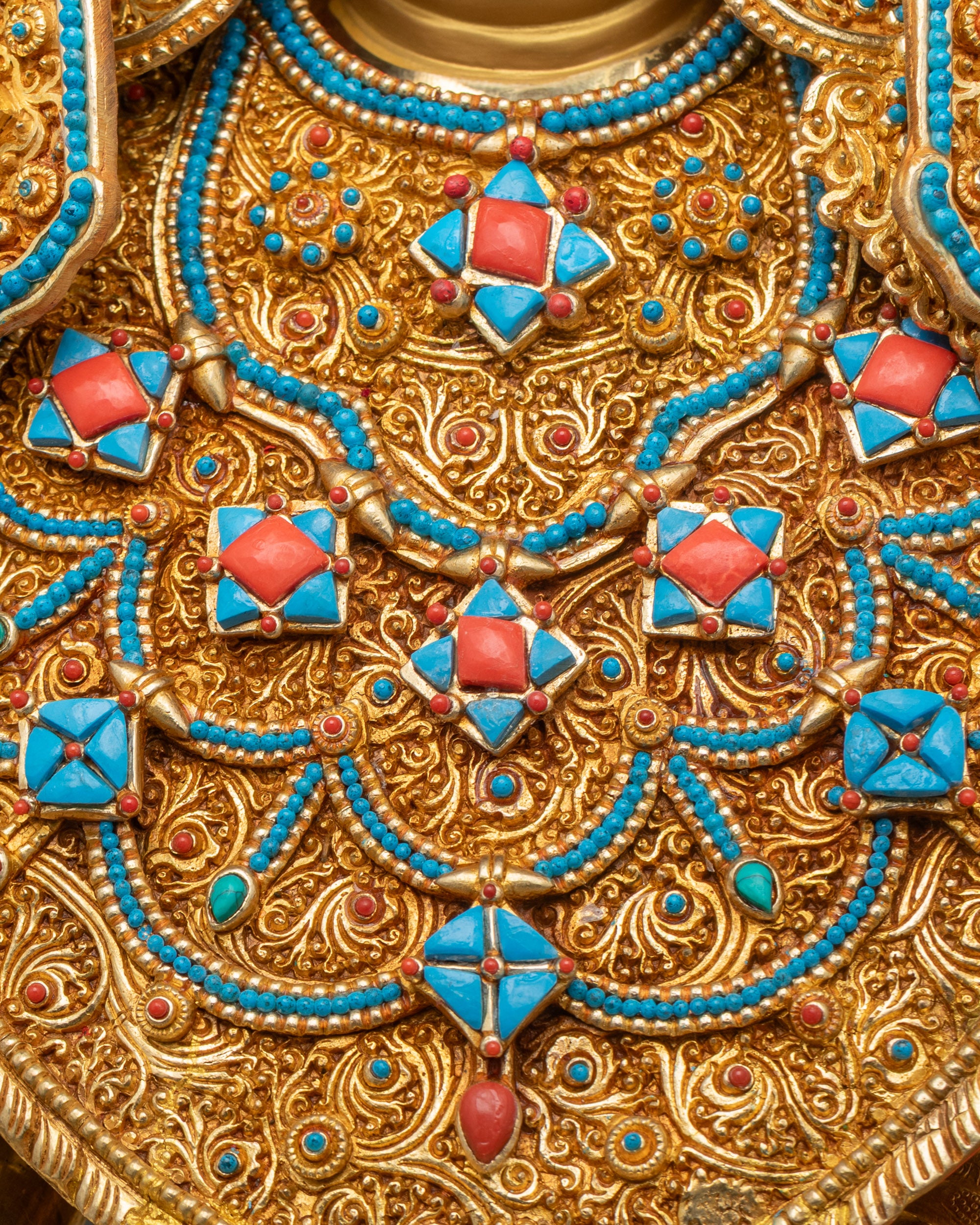 Detailed close-up of floral necklace on Jowo Shakyamuni Rinpoche Sculpture highlighting intricate carving