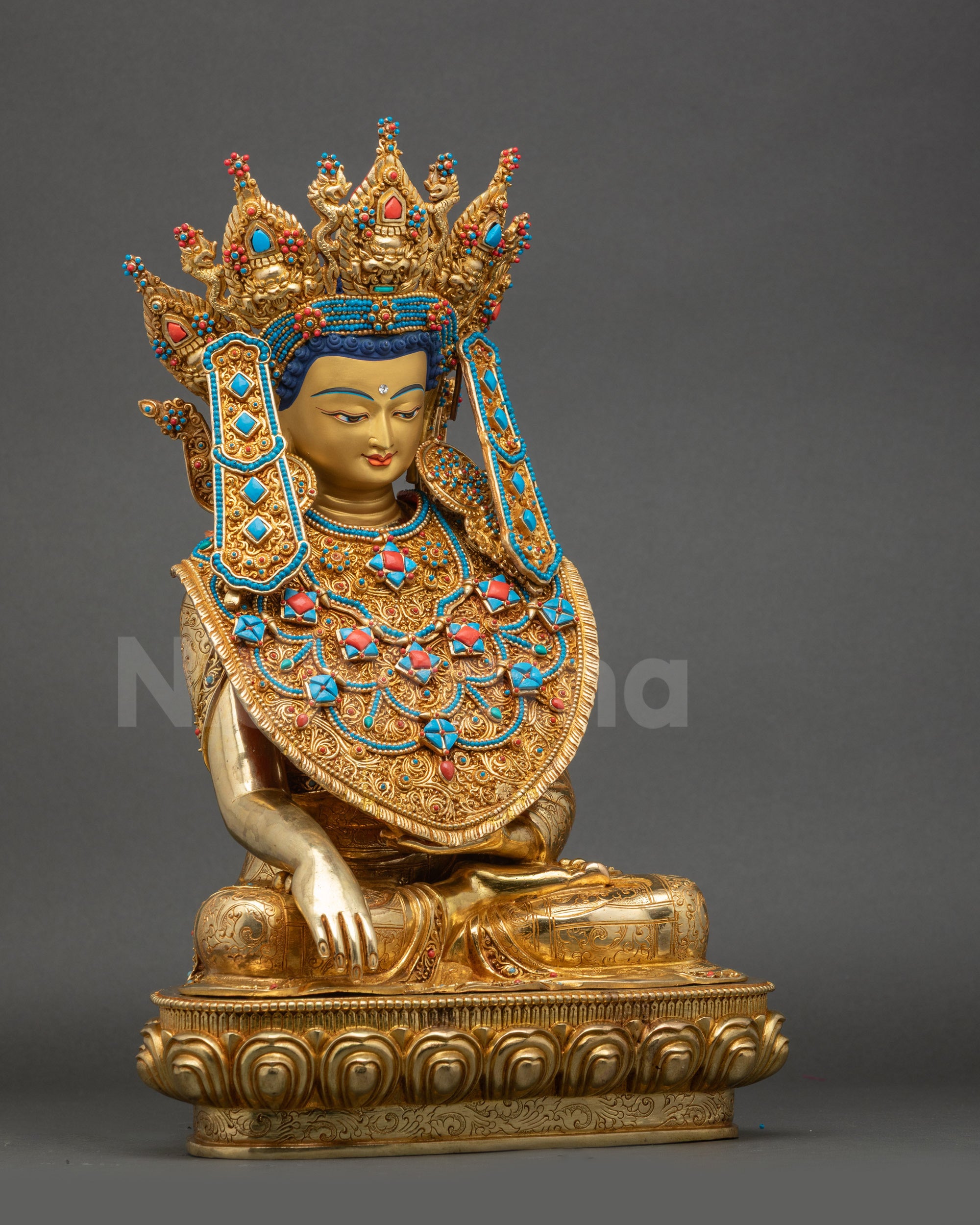 Side view of Jowo Shakyamuni Rinpoche statue showing 3D carvings and gold fire-gilded finish.