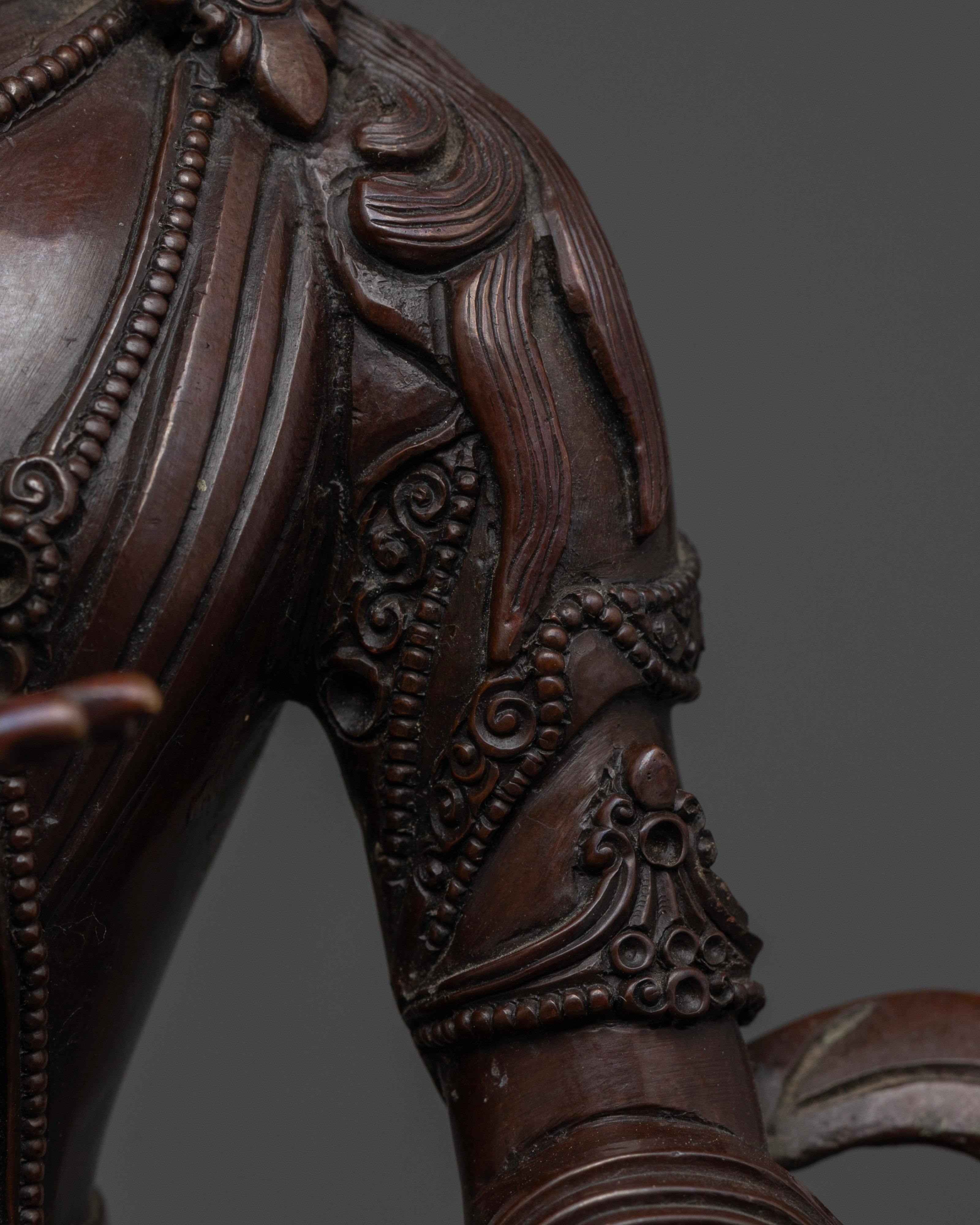 robe and hair of oxidized brown Kshitigarbha statue