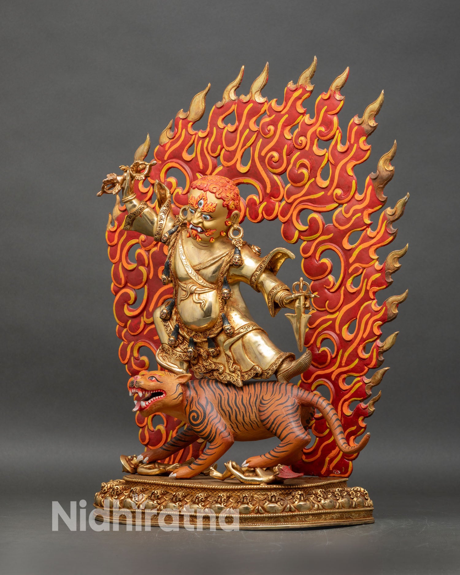 Left profile of Dorje Drolo statue, vivid hand-painted halo, semi-precious stones