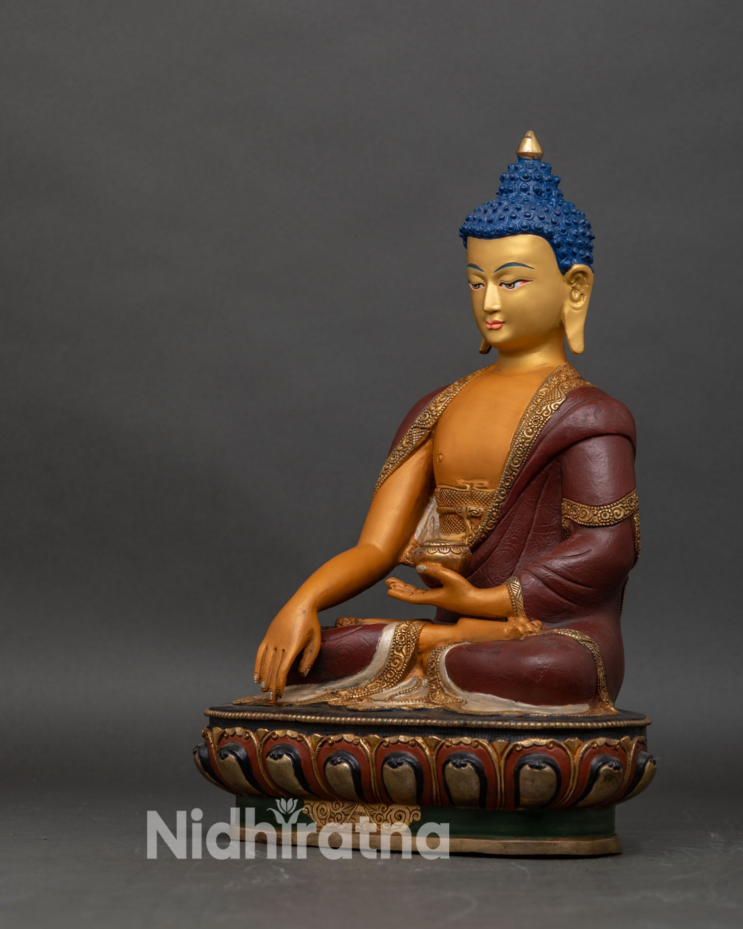 Left profile of Shakyamuni Buddha statue, hand-painted copper and spiritual detailing