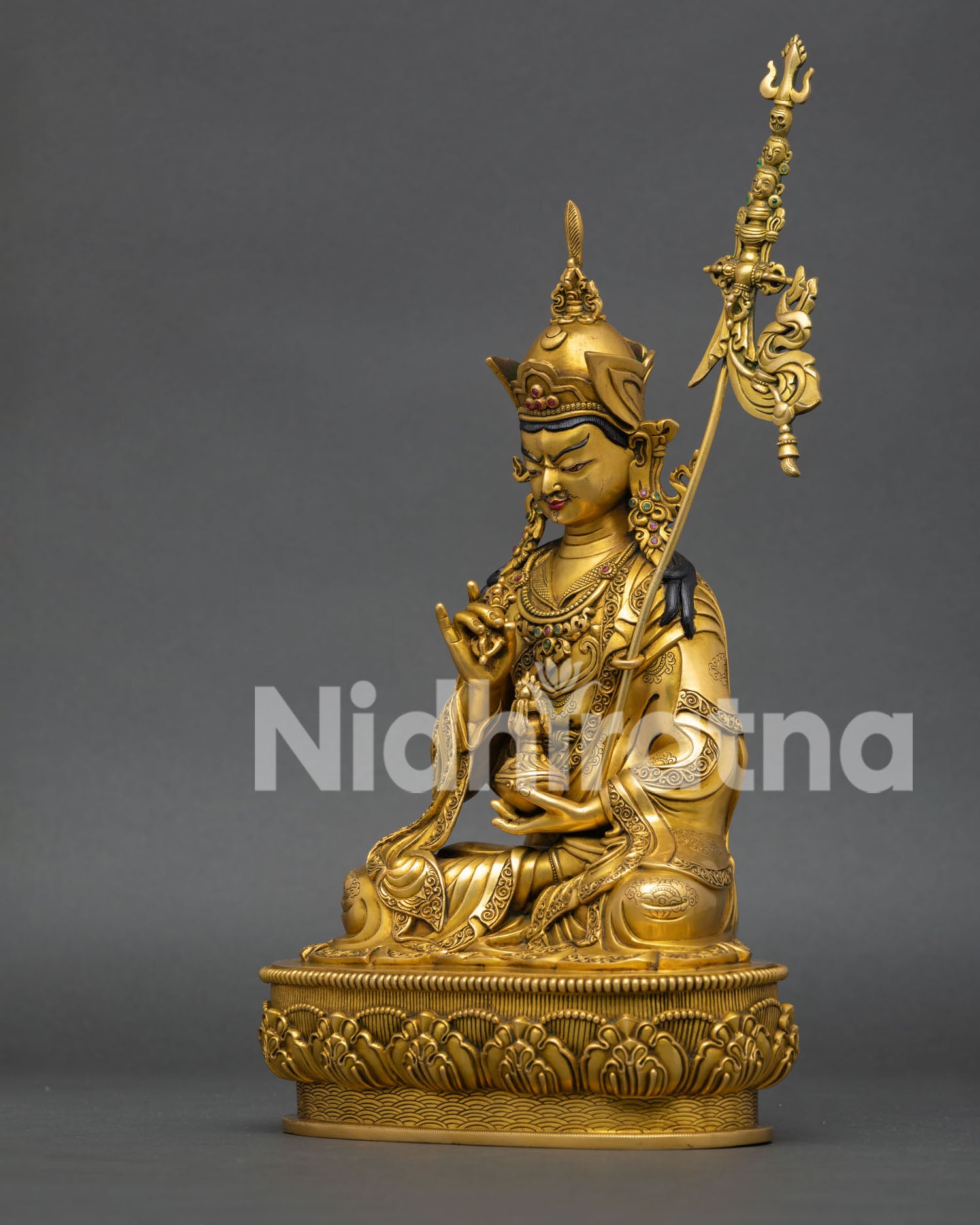 Left Side View of Handcrafted Guru Rinpoche Statue Vajra at Heart Skull Cup on Lap