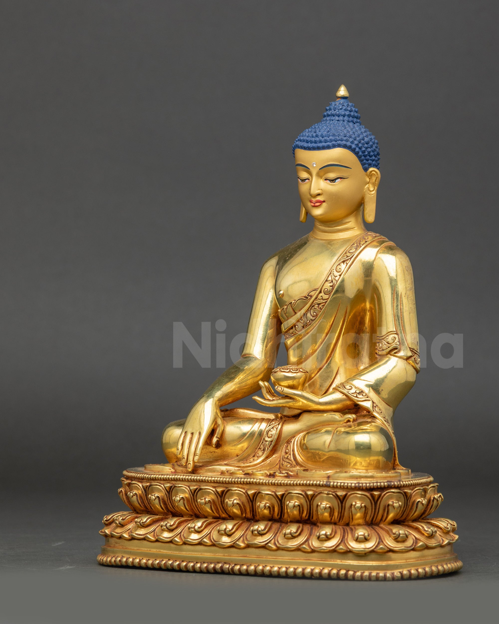 Left-side view of gold-gilded Shakyamuni Buddha statue handcrafted in Nepal