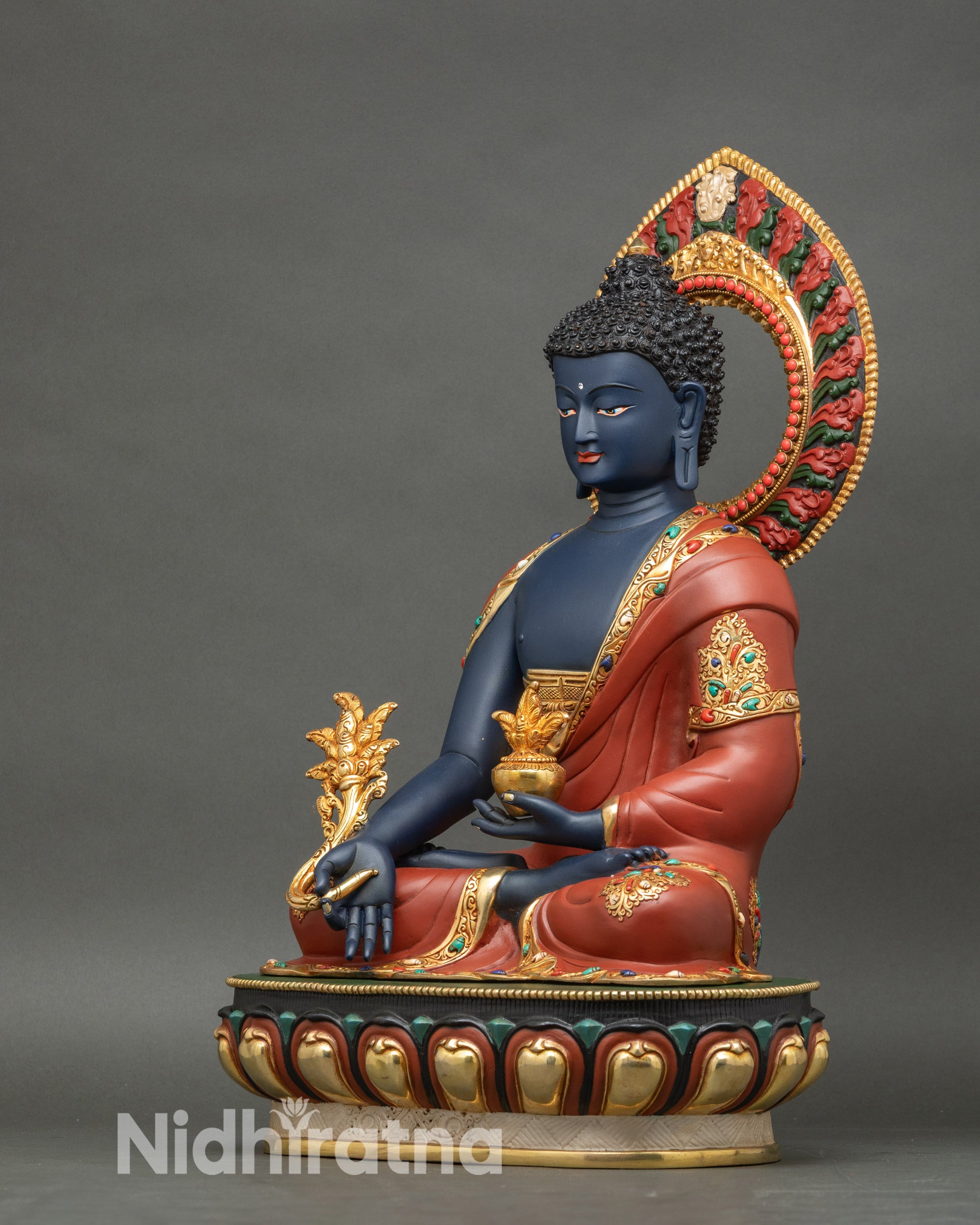 Left profile of Blue Medicine Buddha figurine, gold fire-gilded finish with healing symbolism