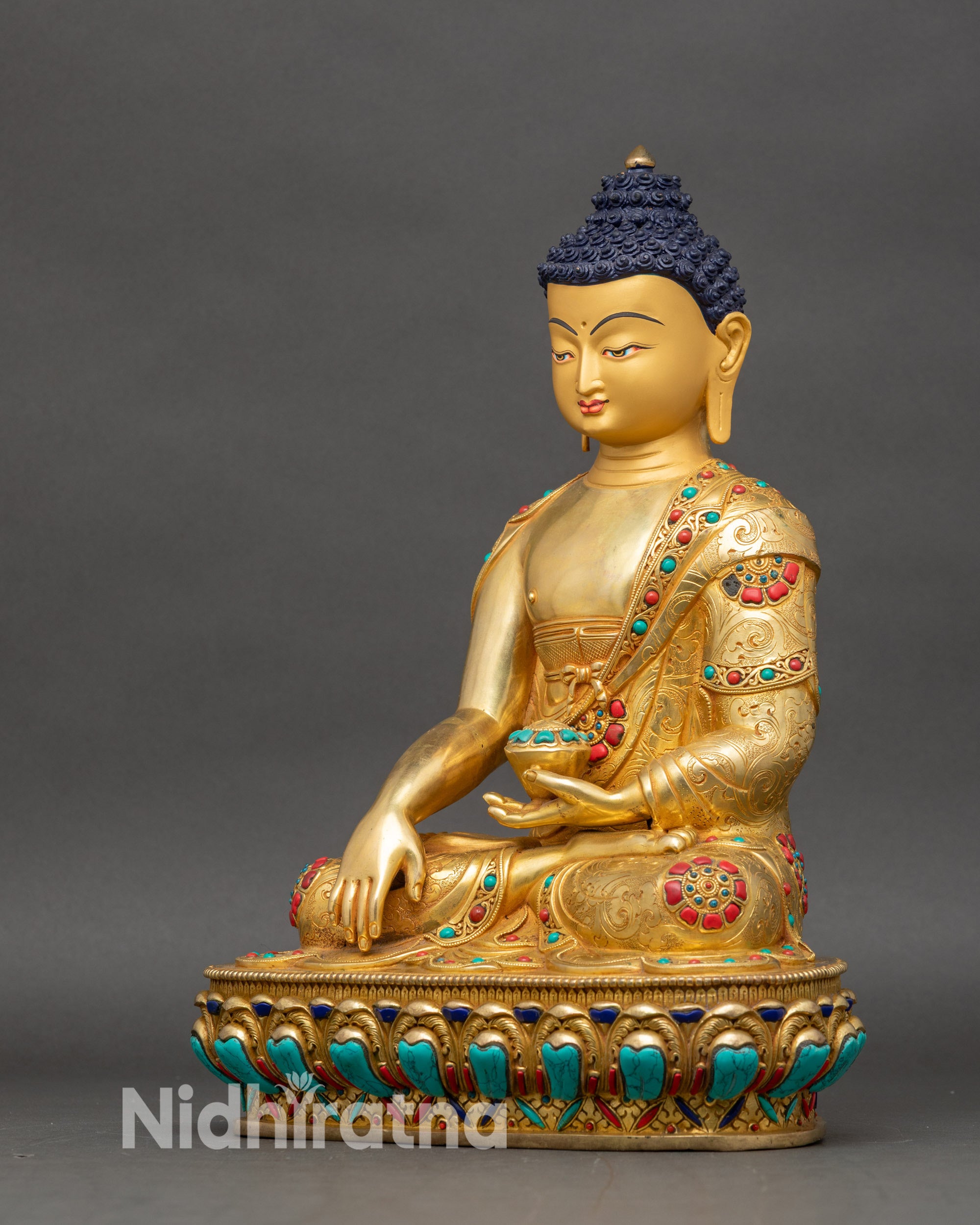 Left profile of Buddha sculpture, handcrafted Nepalese artwork with serene expression