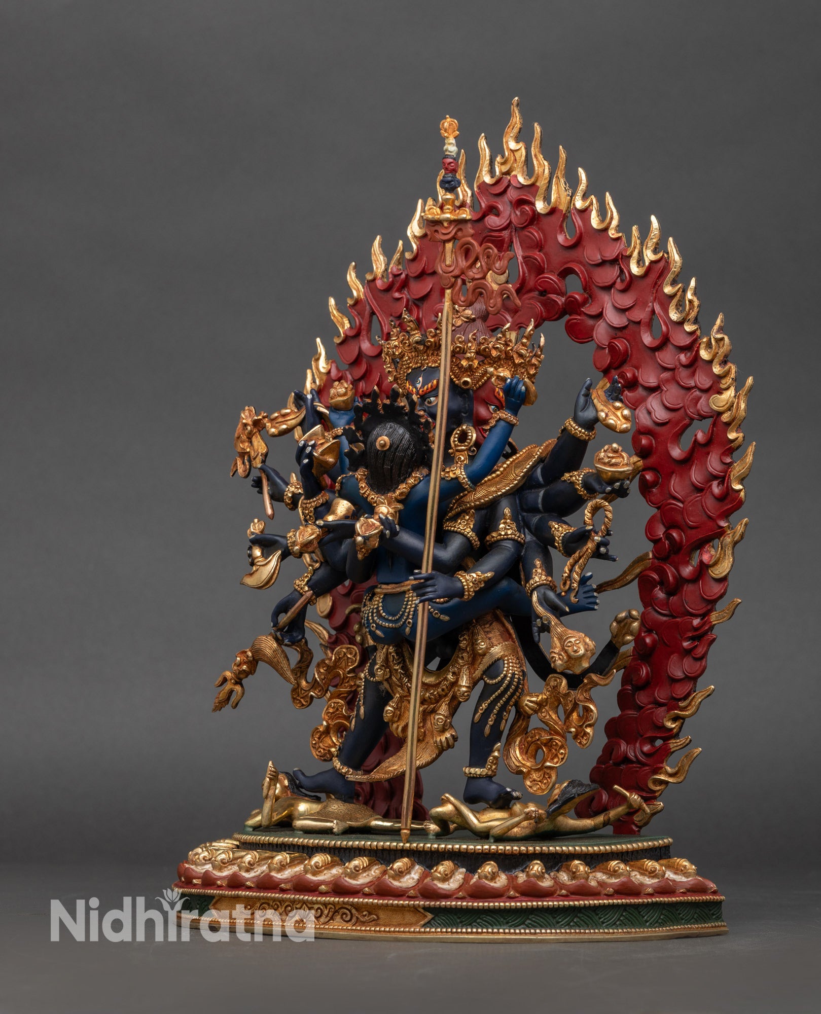 Left profile of Chakrasamvara Yab Yum sculpture with lotus throne detail