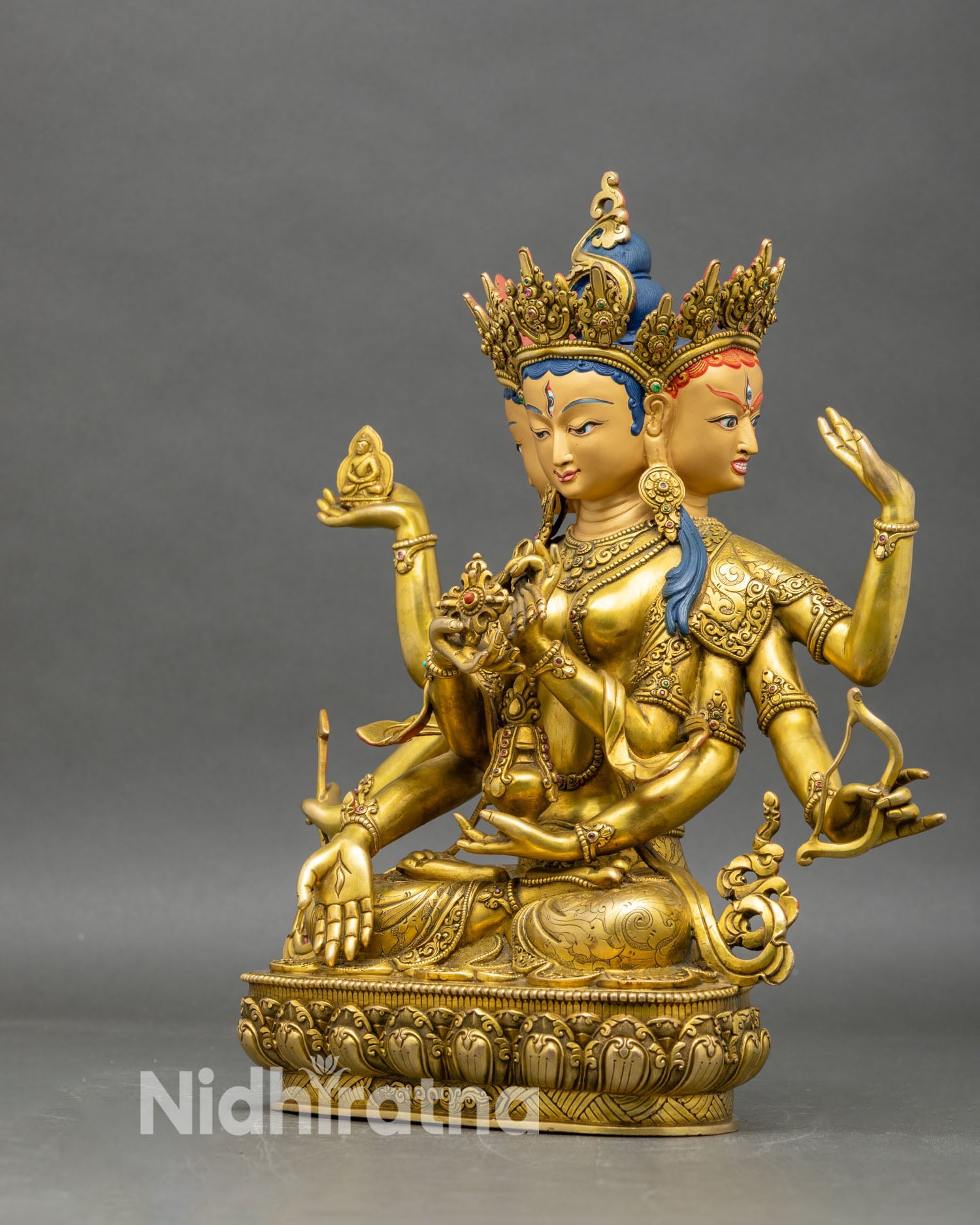 left-profile-of-namgyalma-statue-intricate-copper-and-gold-himalayan-art