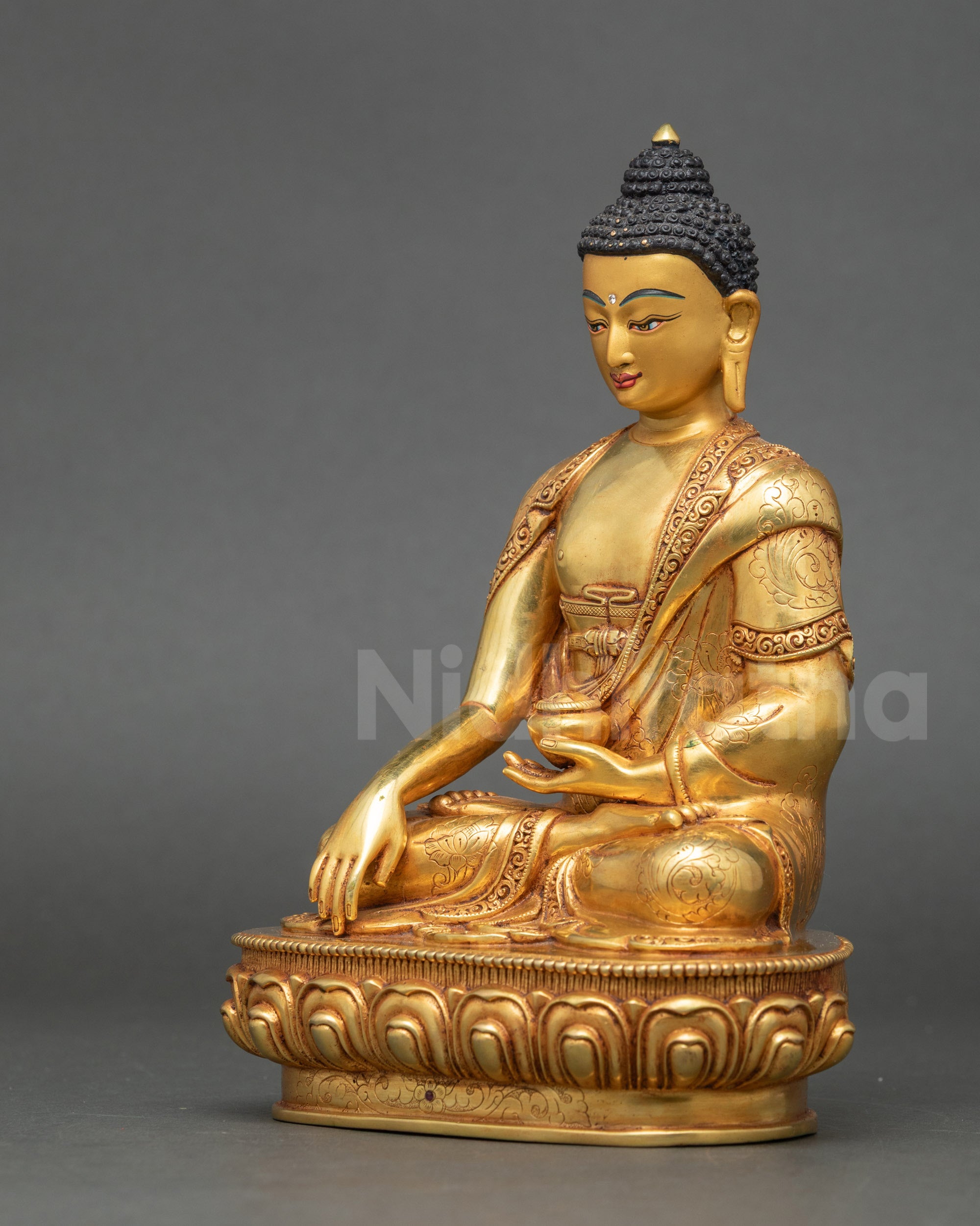 Left side view Gautama Buddha gold-gilded copper statue lotus seat handcrafted Newari