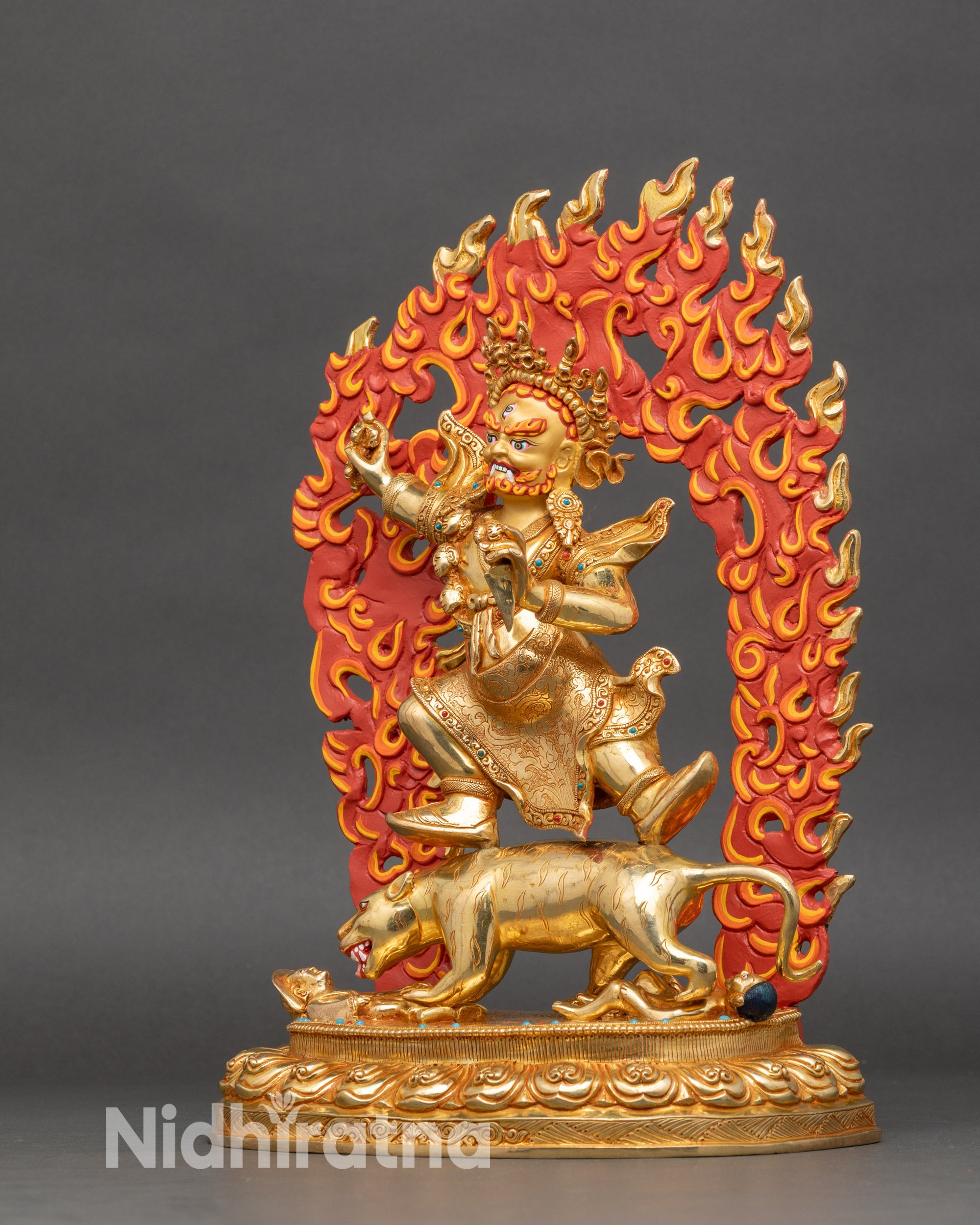 Left side view – Left profile of Dorje Drolo statue emphasizing Vajra, Kīla, and engraved lotus base