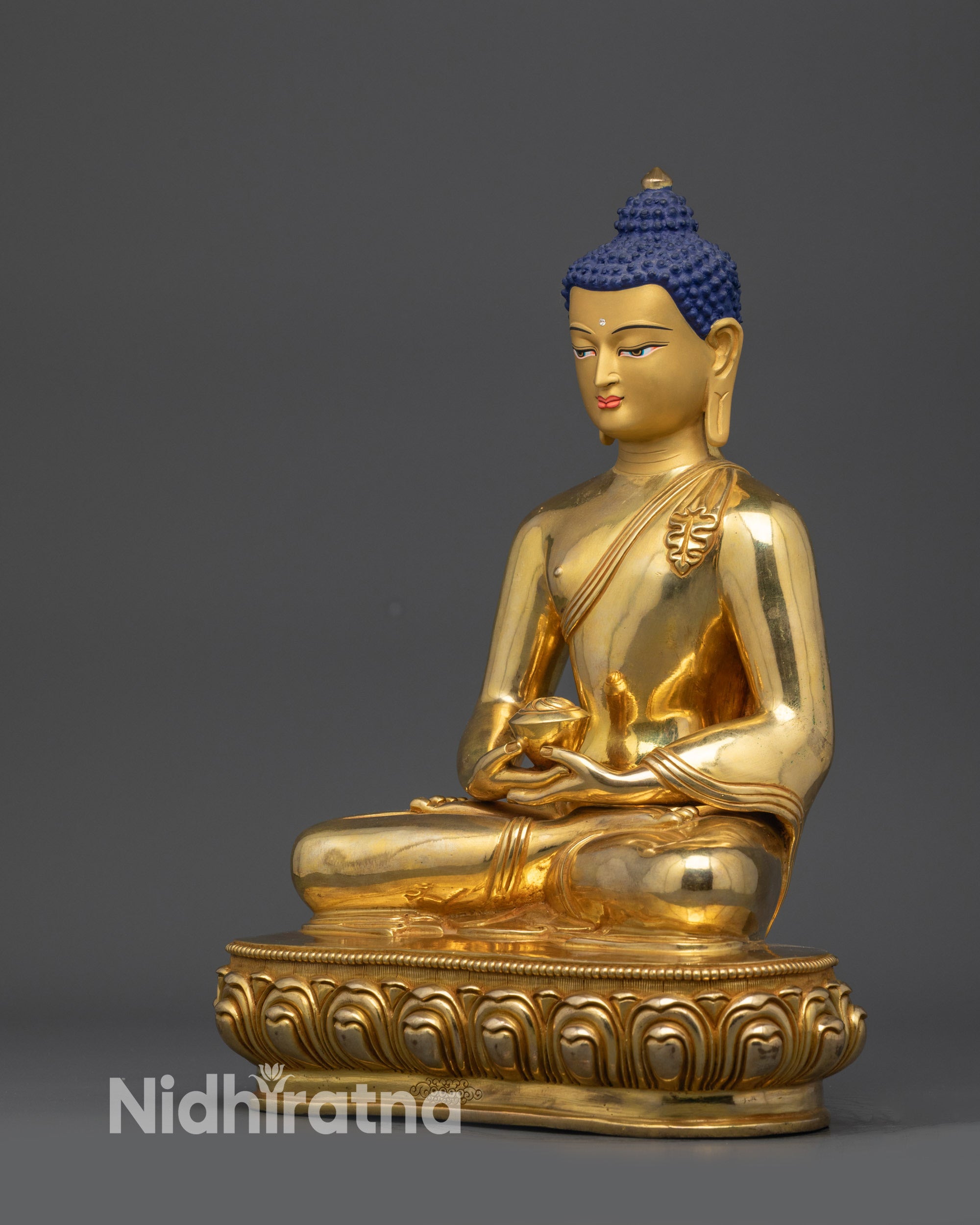 Left side view of Amitabha Buddha Nepalese altar sculpture showing intricate robe carvings