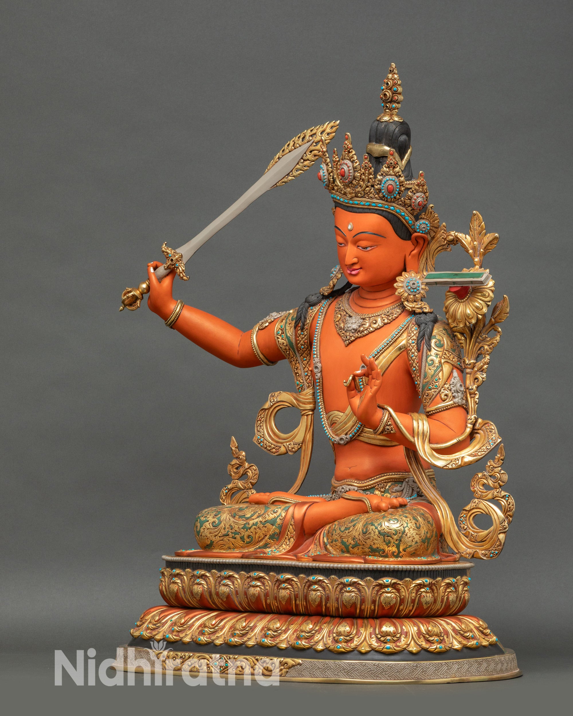 Left side view of Manjushri Bodhisattva Statue – Lost Wax Cast Nepali Buddhist Figurine