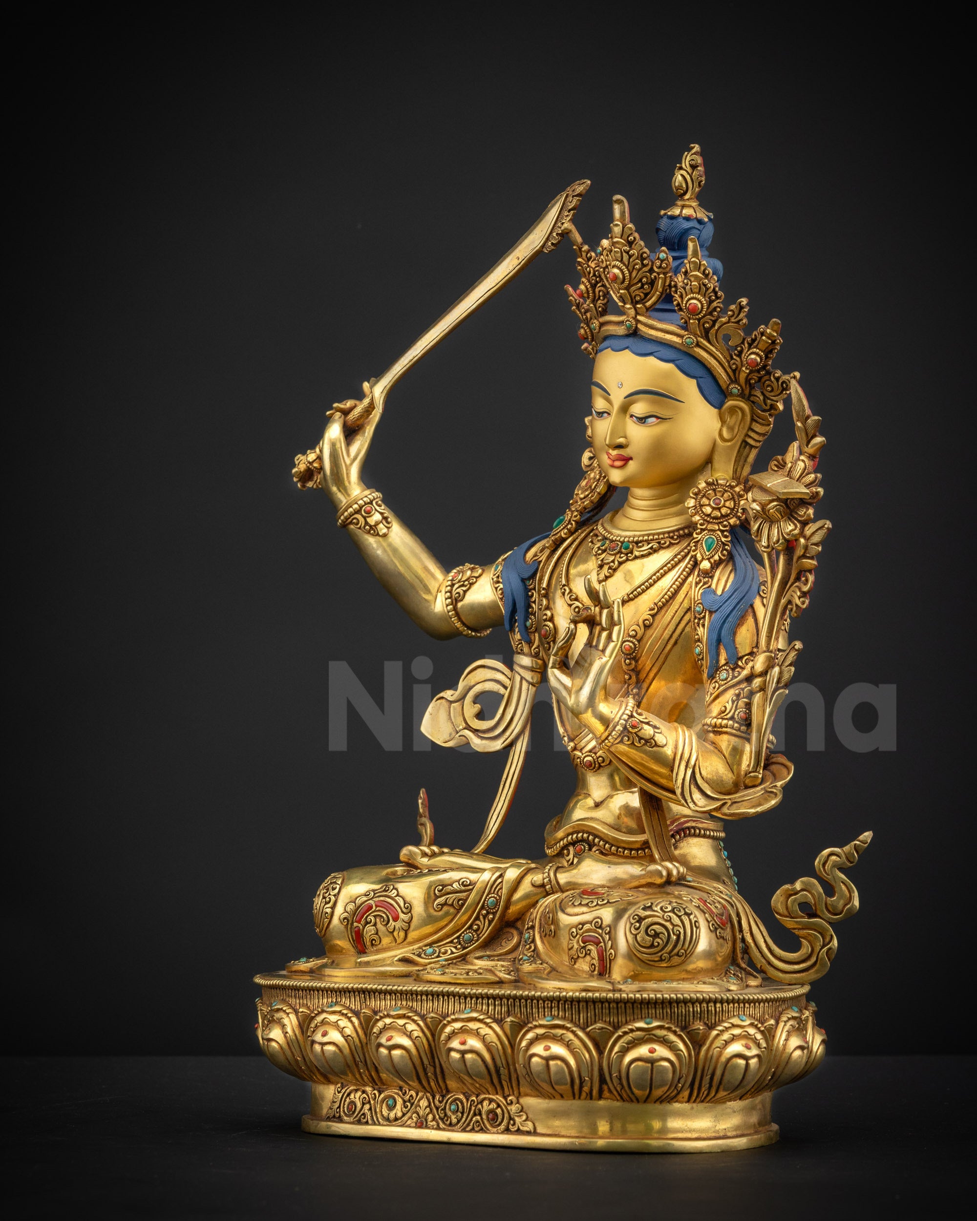 Left side view of Manjushri Bodhisattva holding utpala stem