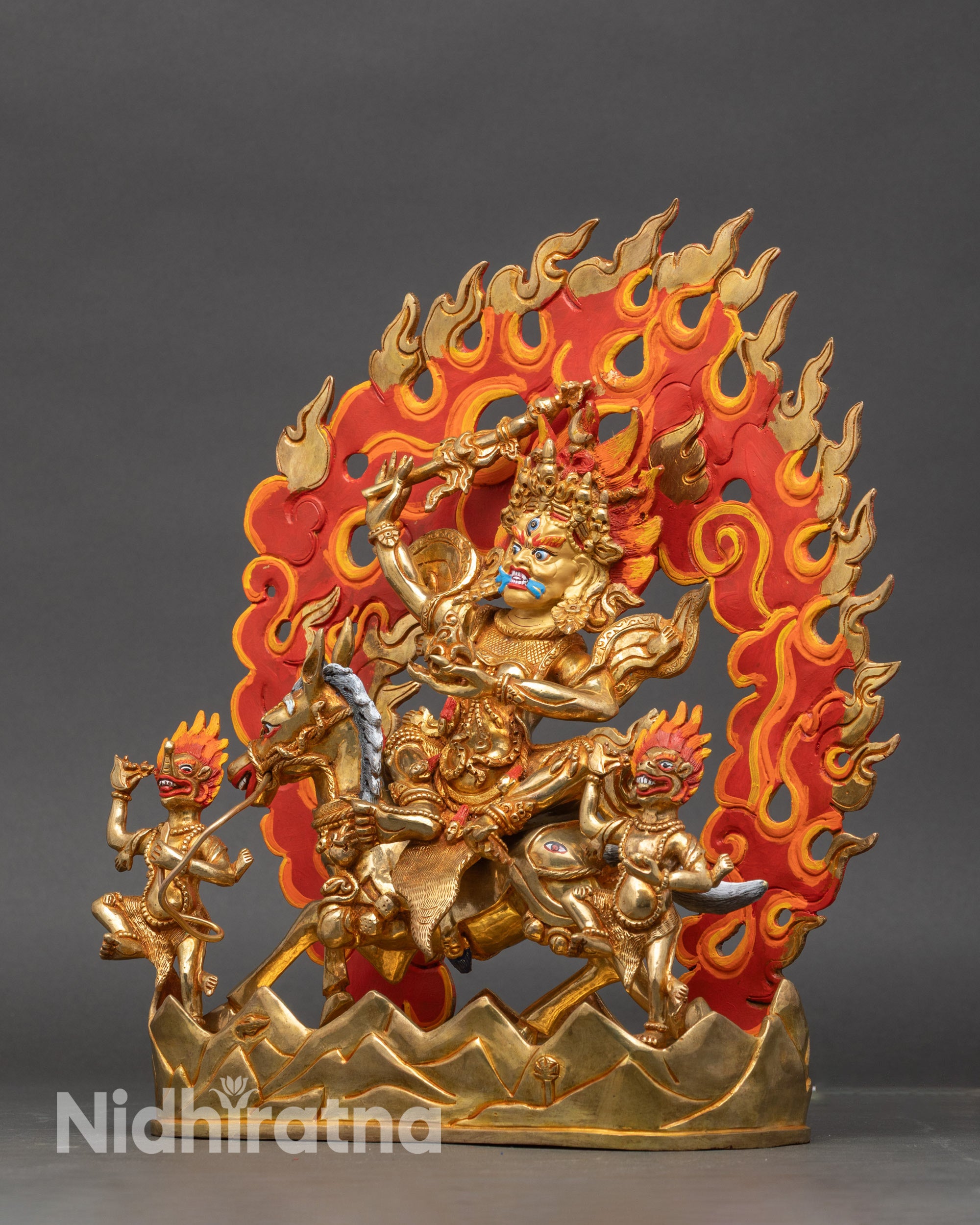 Left side view of Palden Lhamo Statue with ritual khatvanga and skull cup in hand