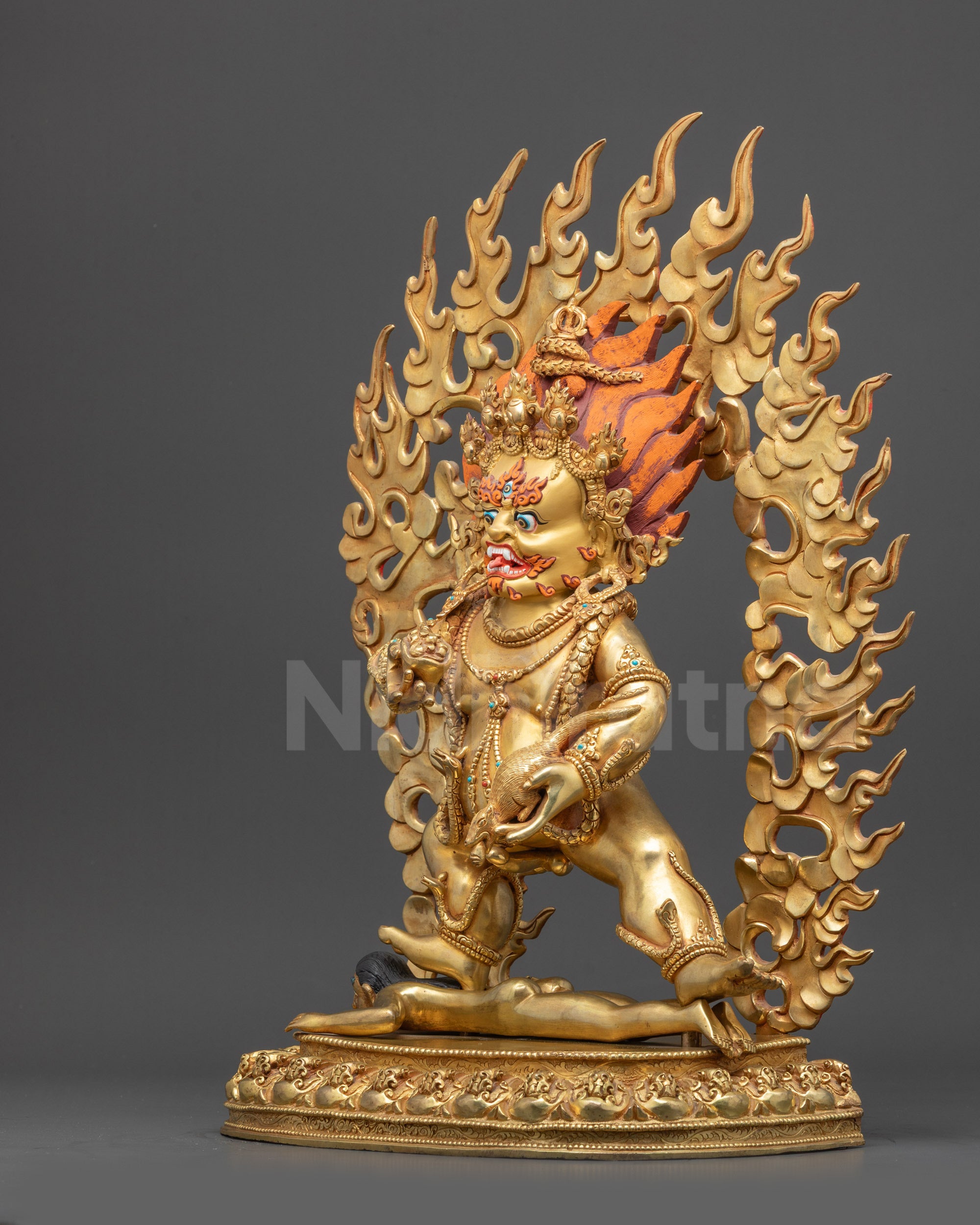 Left view side Black Dzambhala idol with coiled serpent and detailed Wrathflame halo