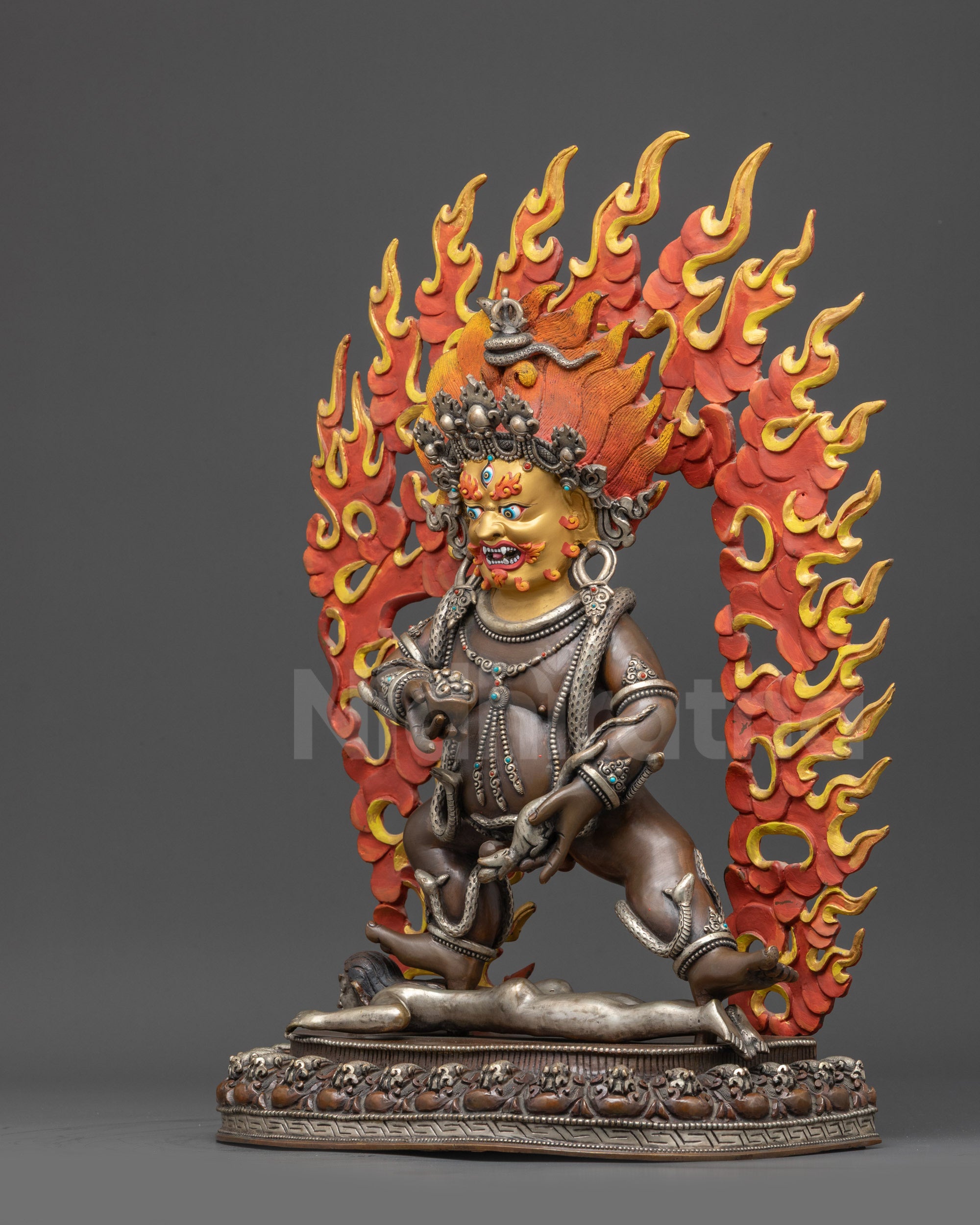 Left view side Oxidized Black Dzambhala statue with serpent and semi-precious inlays