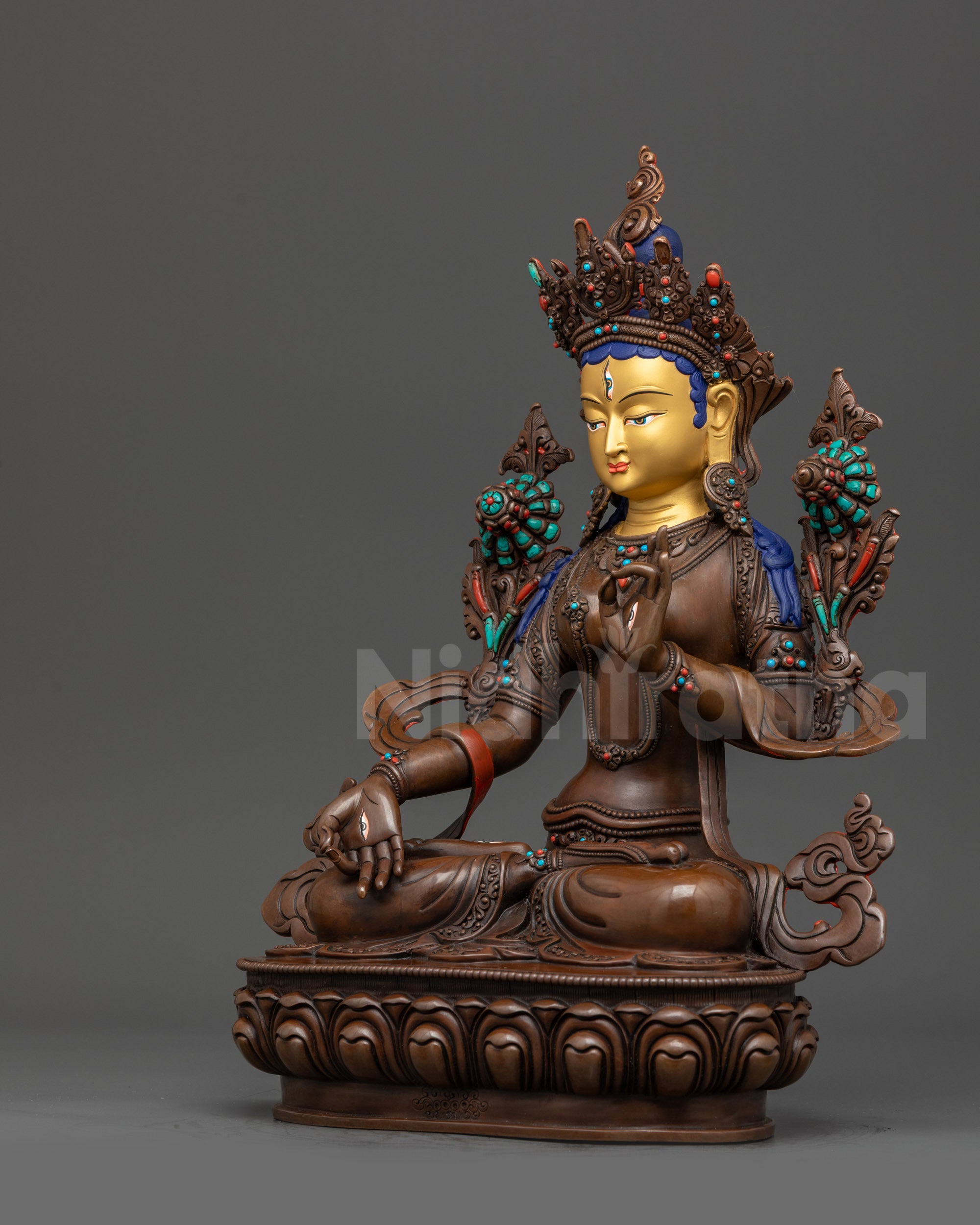 Left view side White Tara oxidized statue with Vitarka mudra and intricate jewelry details