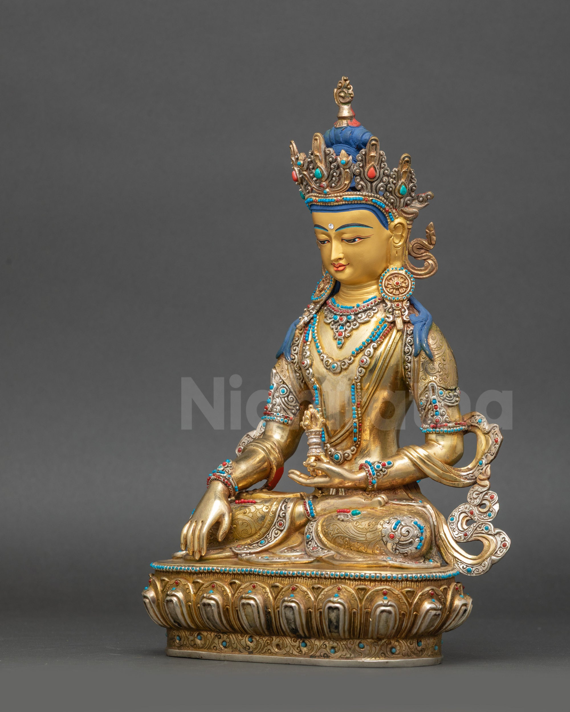Left view side of Akshobhya Mitrugpa Statue highlighting floating robe and sacred posture