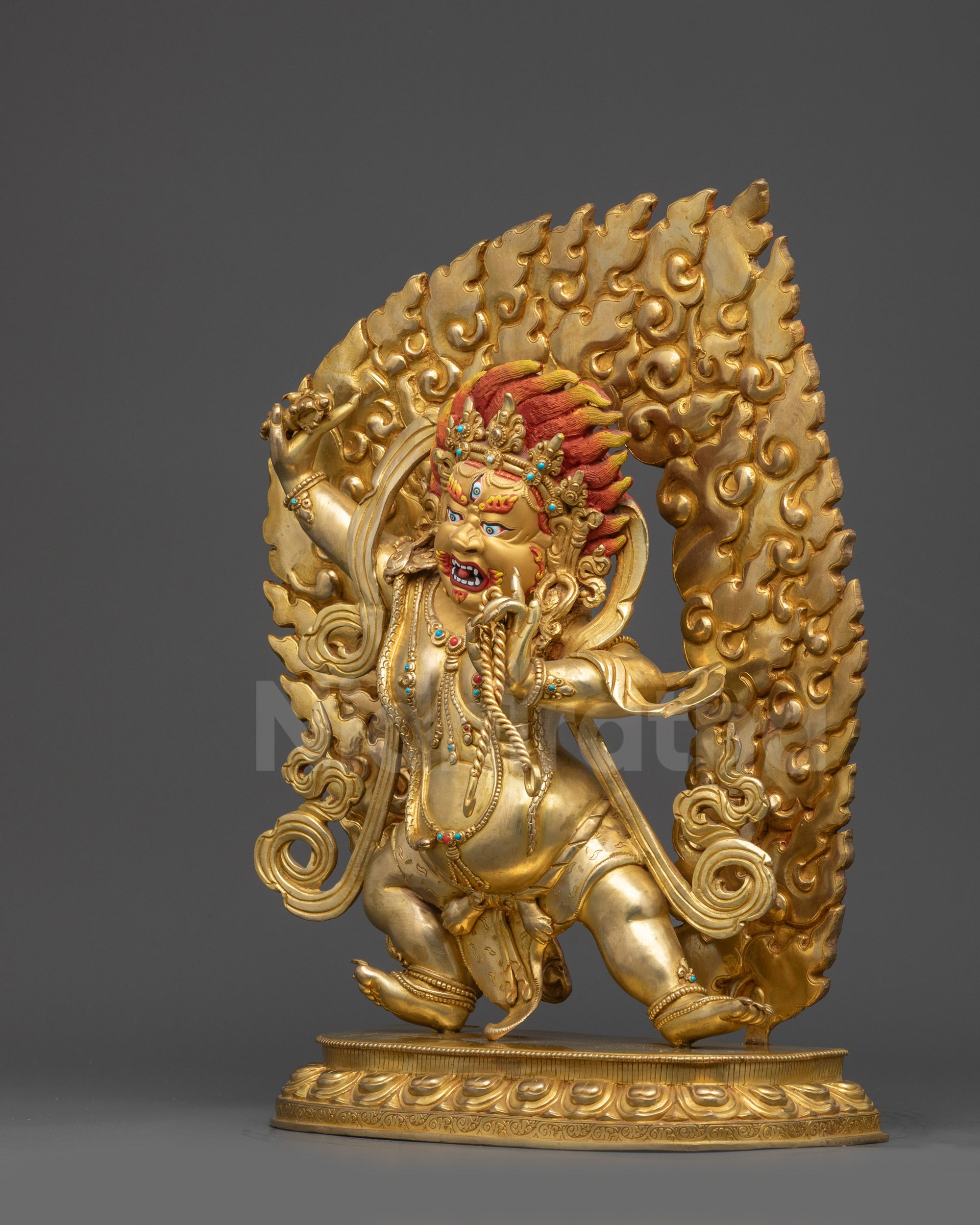 Left view side of Vajrapani with detailed robe patterns and lotus base