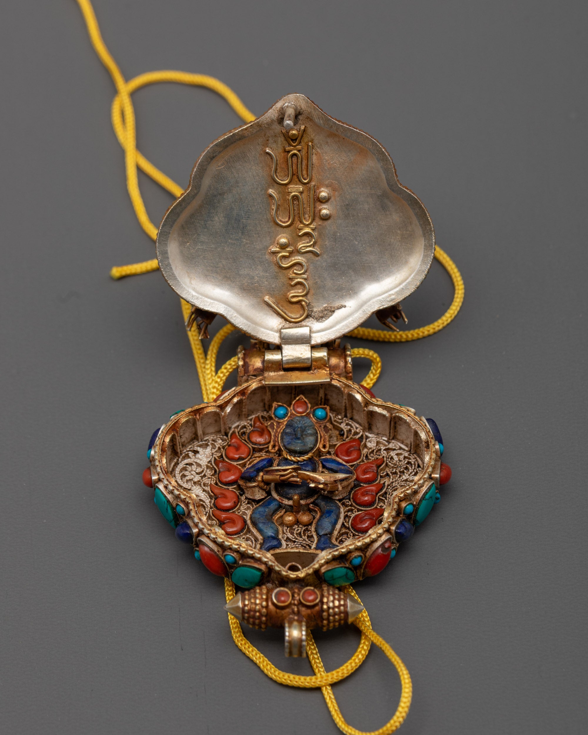 Buddhist Garuda and Dzambhala Praying Locket