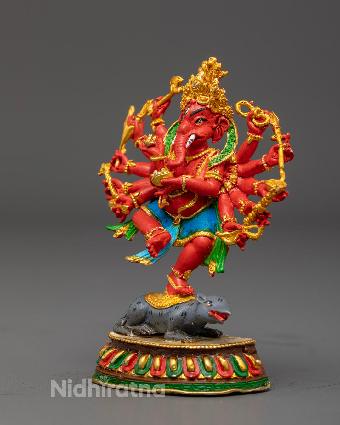 Lord Ganesha idol with radiant green halo and hollow lotus throne base designed for mantra filling and meditation focus.