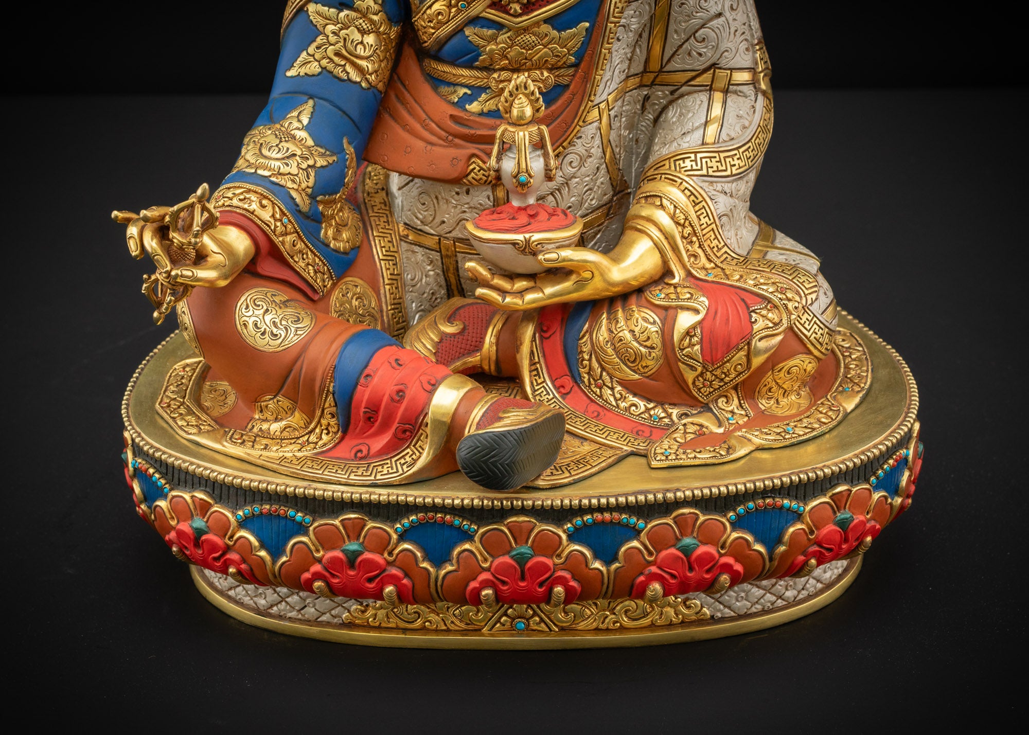Lower front view of Guru Padmasambhava lotus pedestal and base detailing