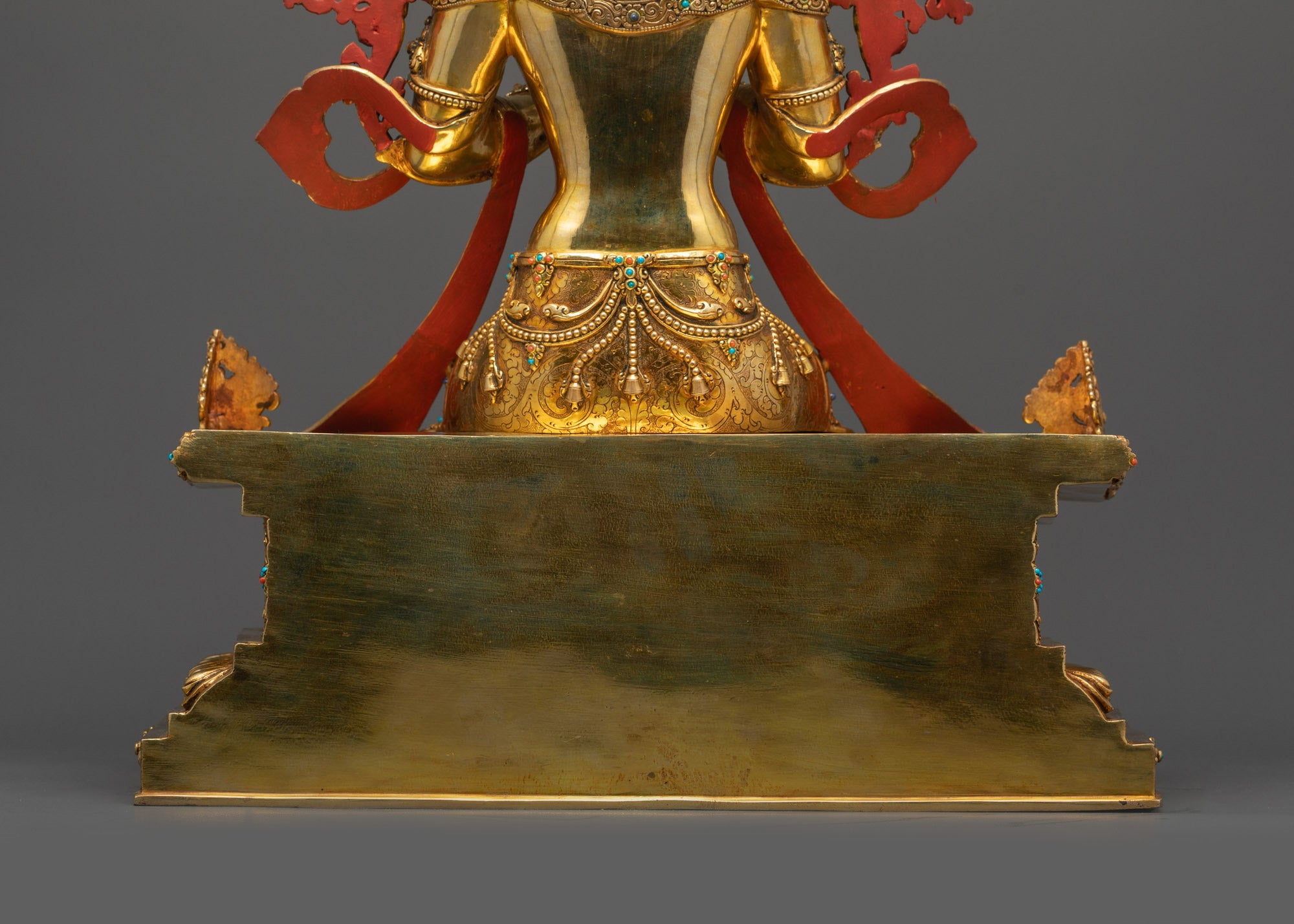 Lower landscape back Maitreya Buddha showing elaborate halo and celestial carvings