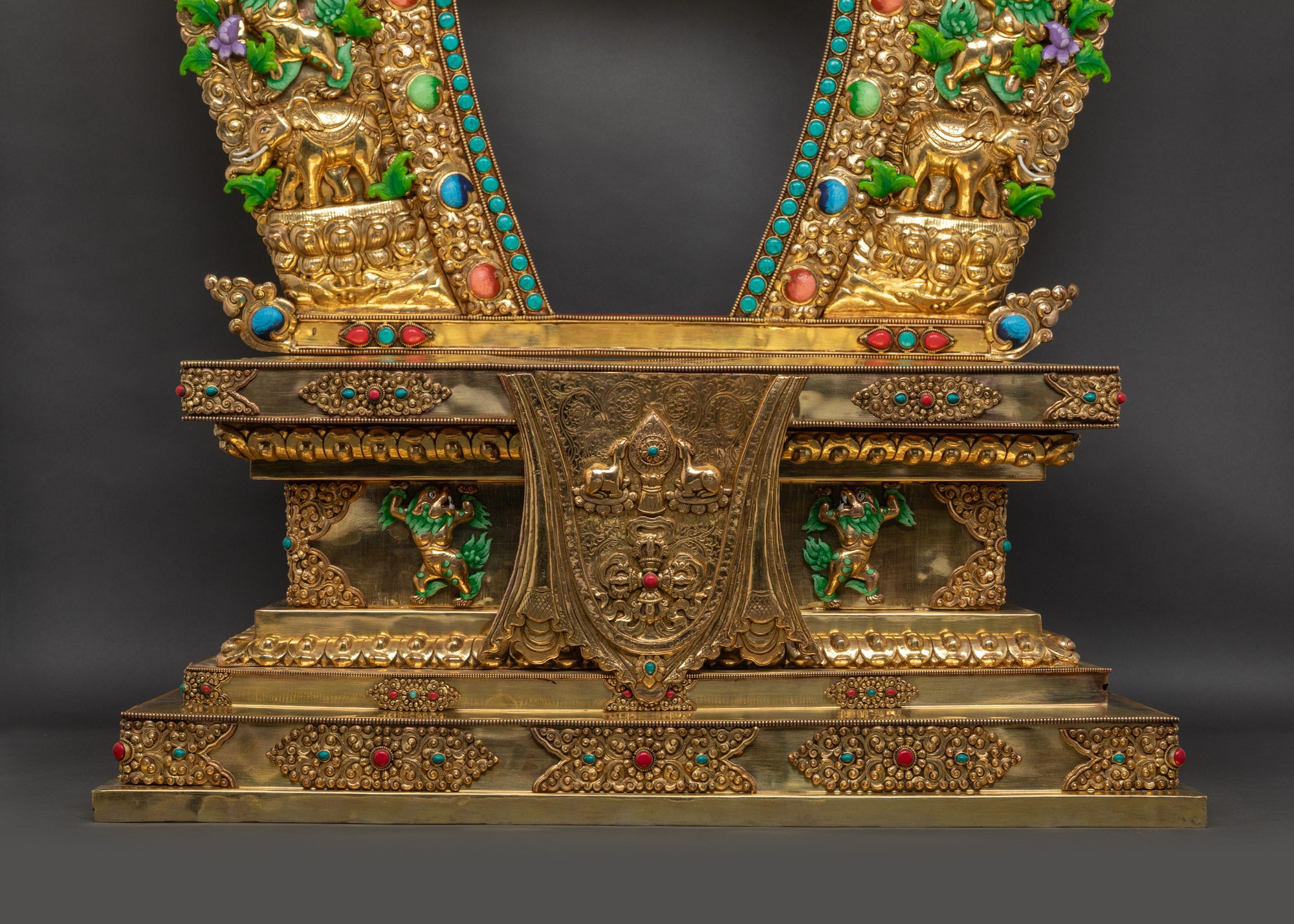 Lower landscape front Vajrayana Throne fire-gilded torana with carved halo and stepped tiers