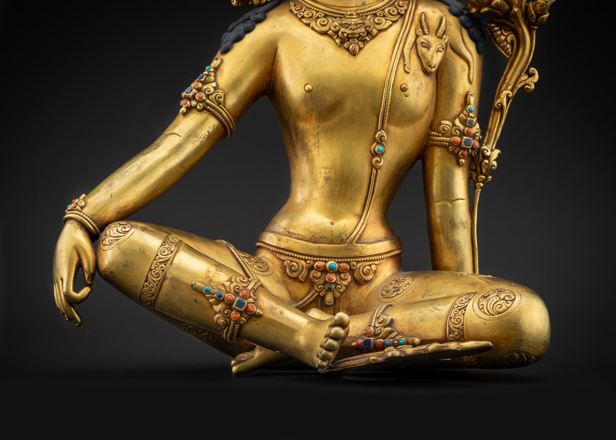 Lower landscape front of Chenrezig statue, full view on altar or decorative base