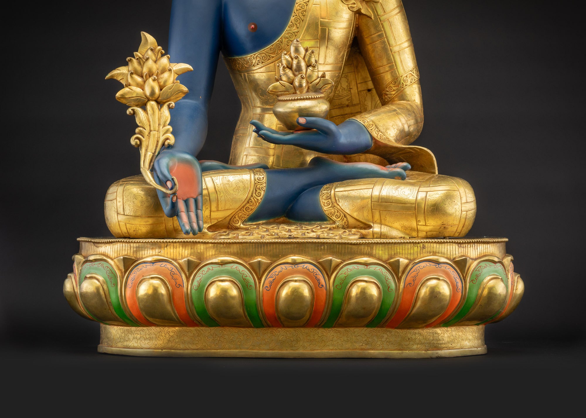 Lower landscape front view of Healing Medicine Buddha Statue seated on lotus base