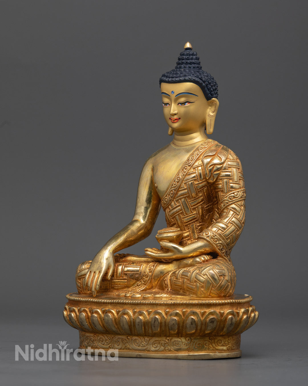 Luxurious 24k gold gilded Shakyamuni Buddha statue, perfect for meditation spaces, altars, and spiritual practices, handcrafted by skilled Nepalese artisans