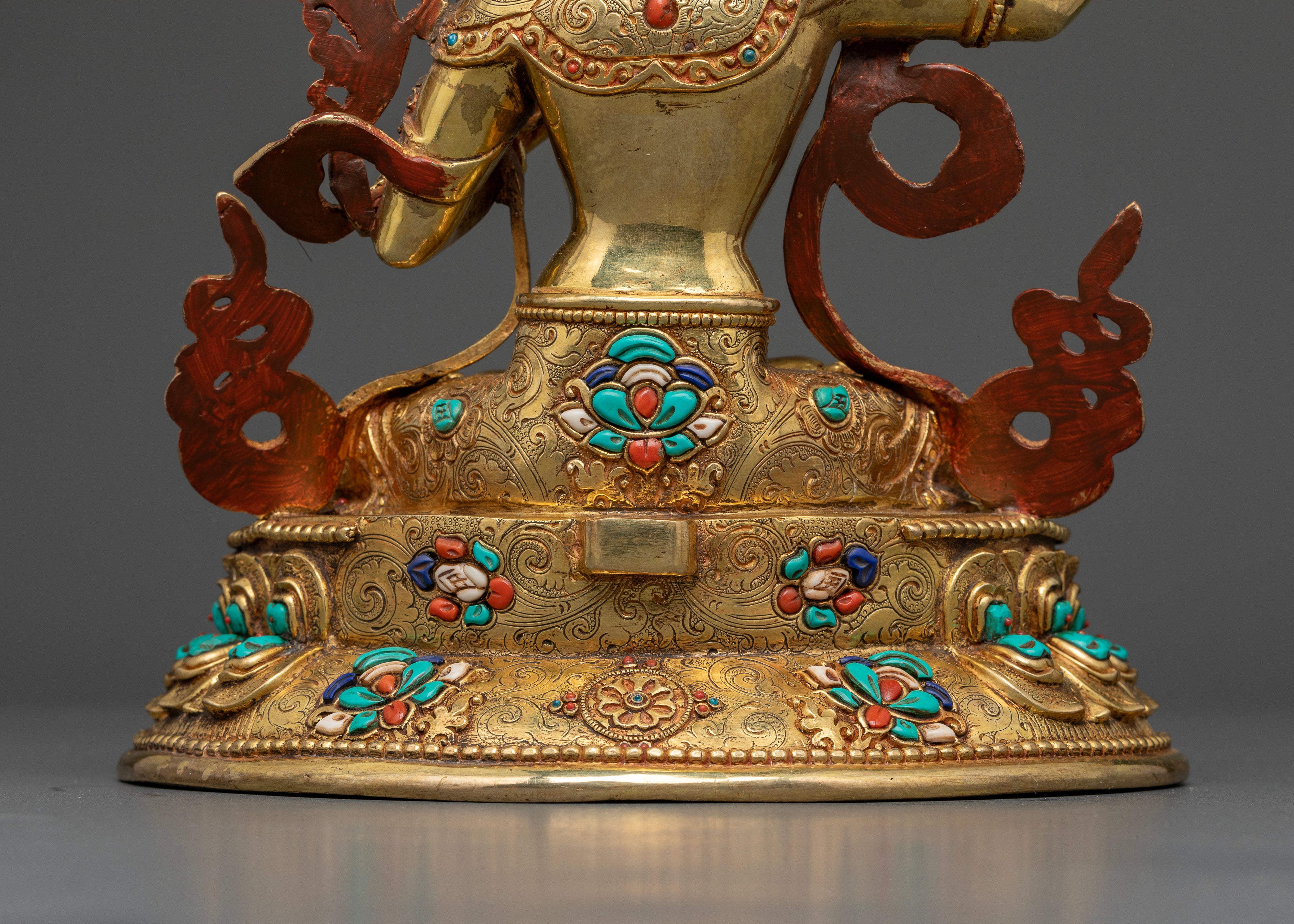 Manjushri Seated on a Lotus Throne with Gemstone Halo