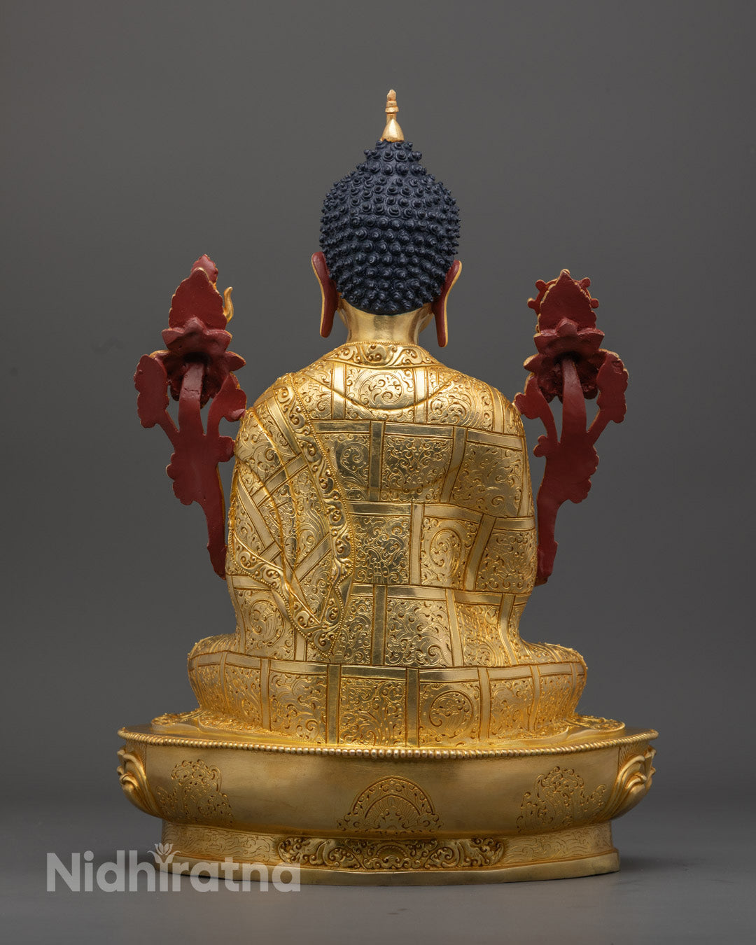 Maitreya Buddha, handmade using the lost wax method with vibrant gold-gilded copper detailing.