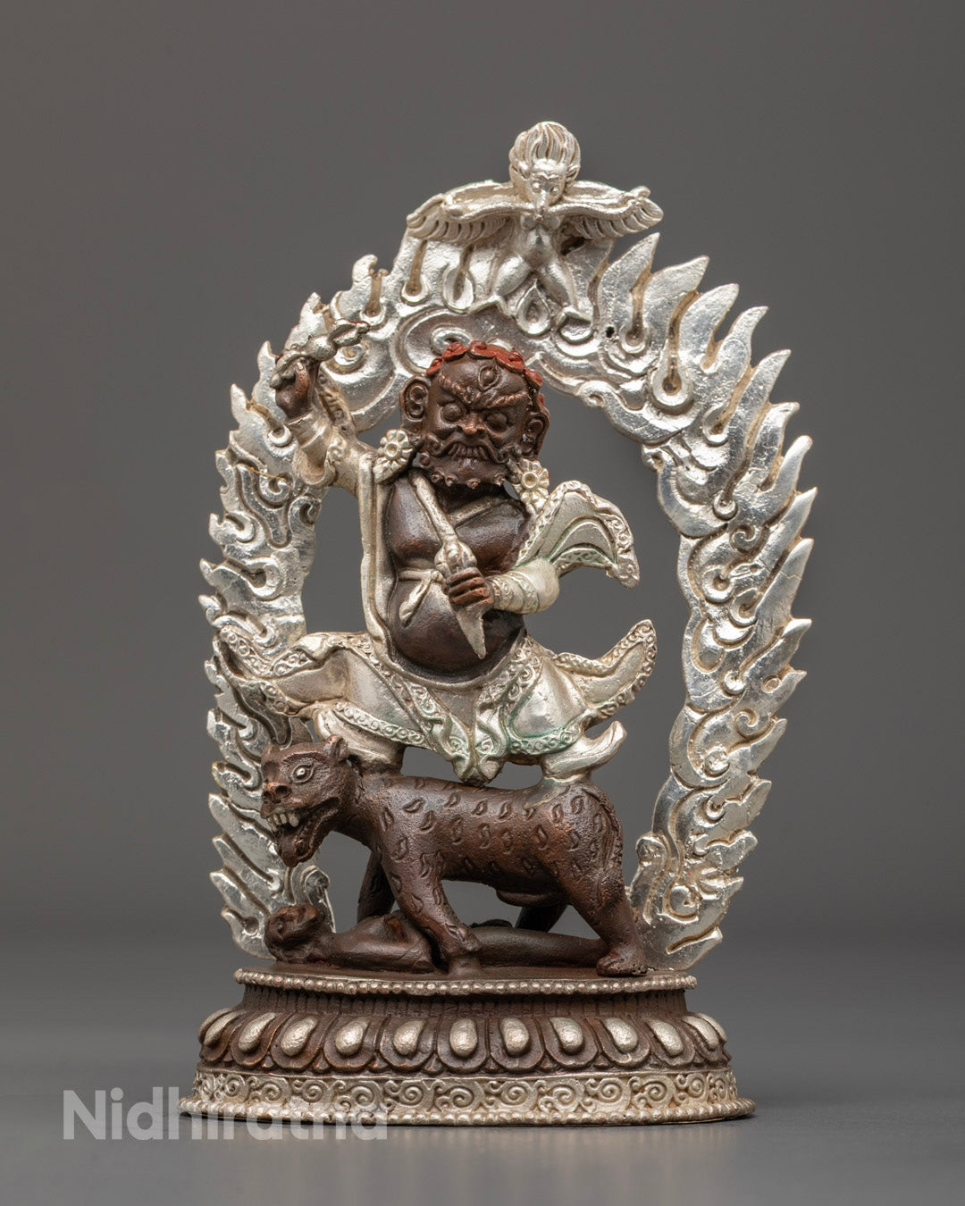 Machine-made Dorje Drolo statue with silver-plated finish and rich acrylic colors