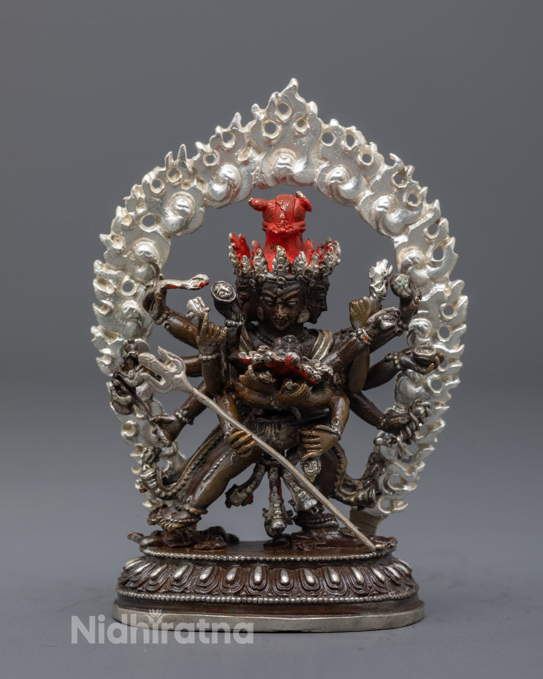 Machine made Chakrasamvara Consort Statue in oxidized copper with silver plated halo and lotus throne hand painted with vibrant acrylic colors