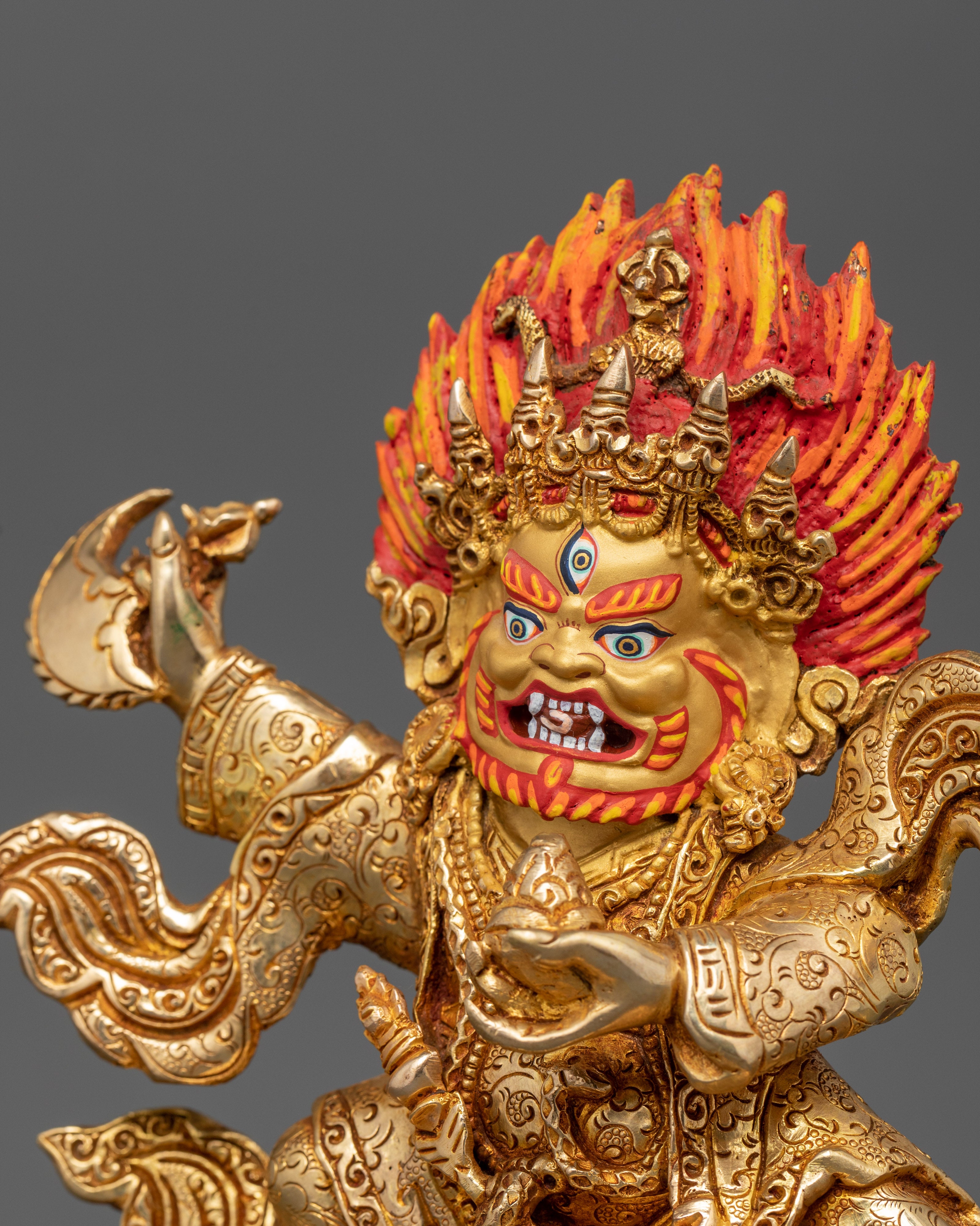 Mahakala Bernagchen holding flaying knife and skull cup, seated on lotus throne