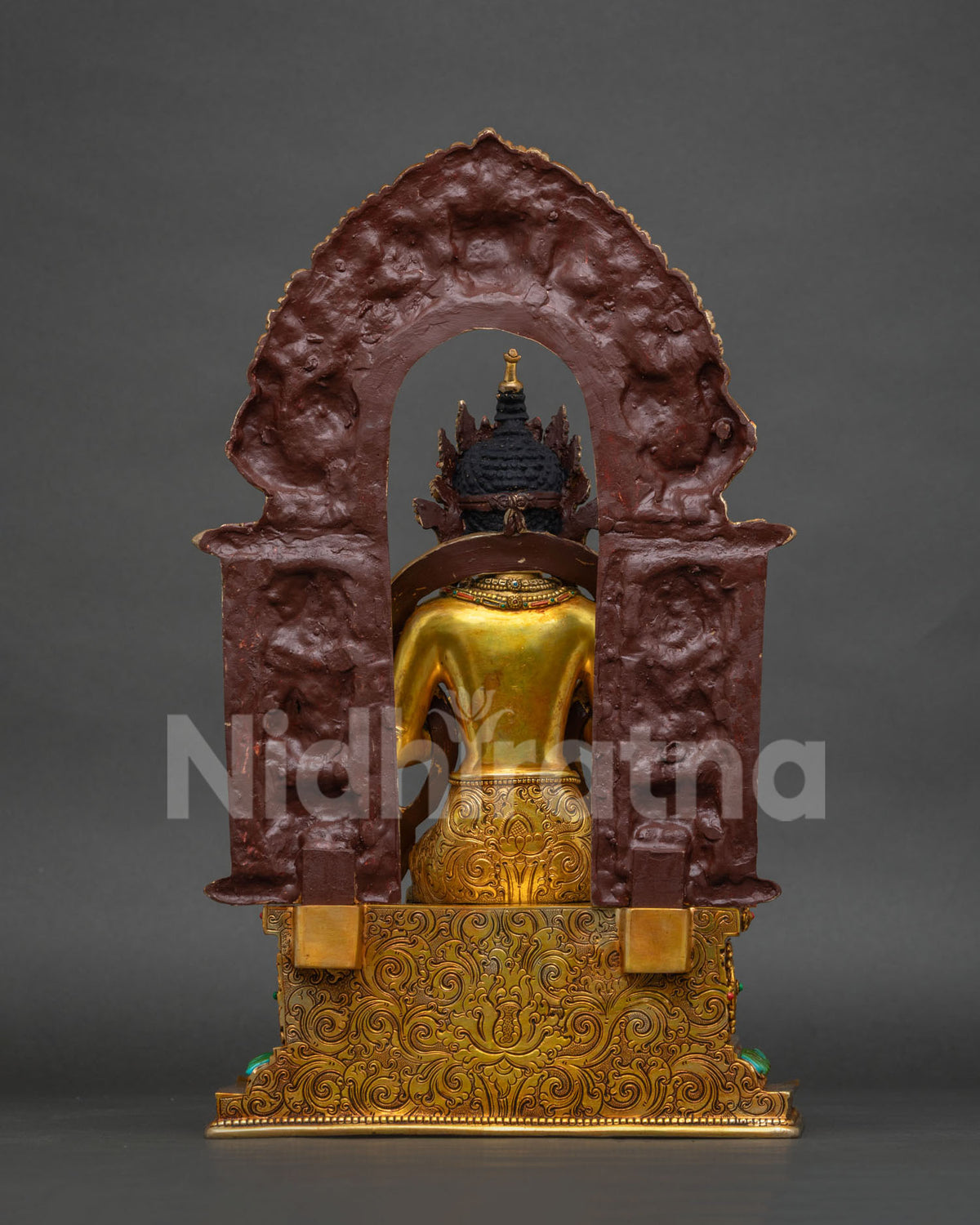 Left side view of gold-gilded Maitreya Buddha statue, Nepal craftsmanship