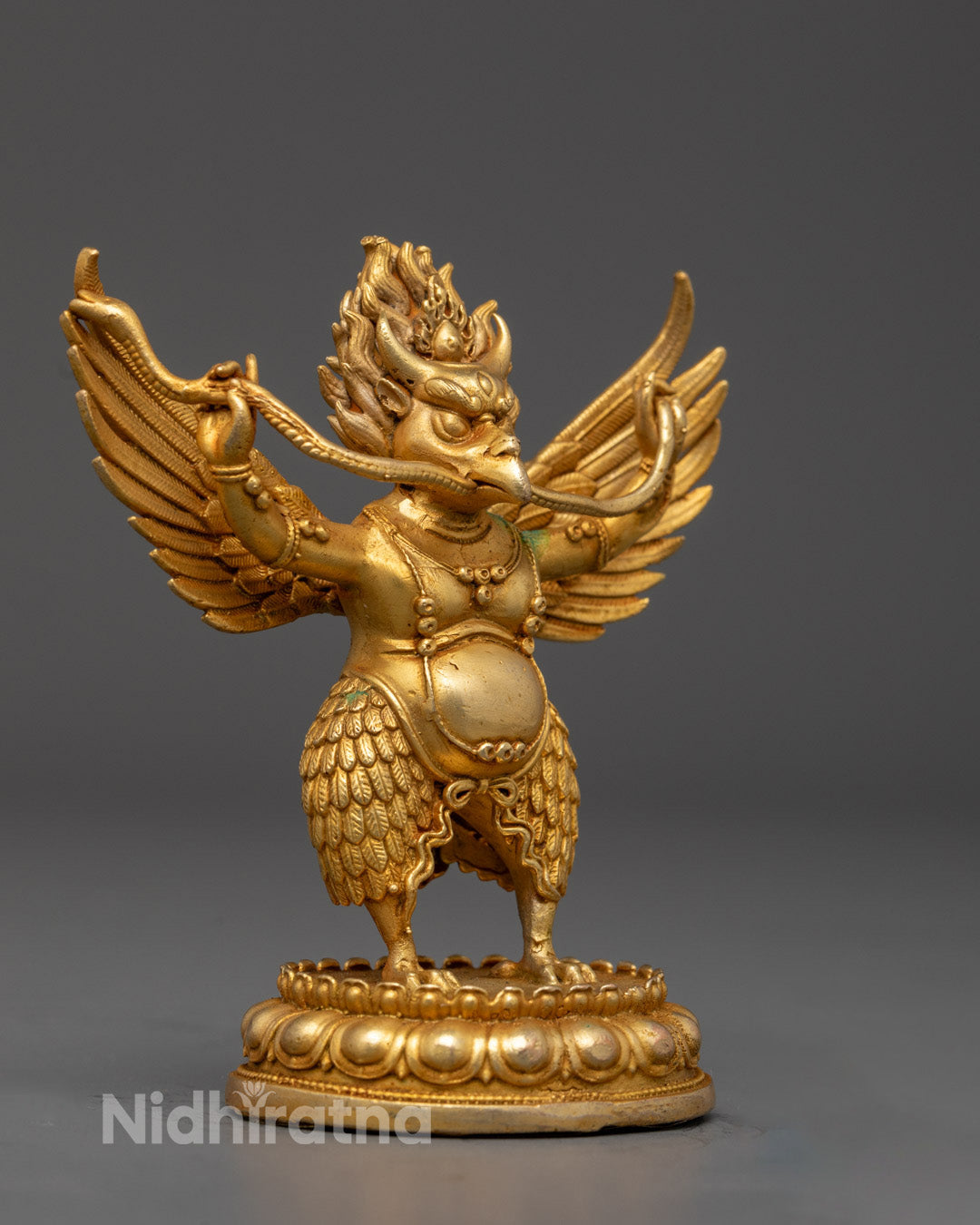Majestic wings of Garuda Statue symbolizing divine power and protection in Hindu mythology
