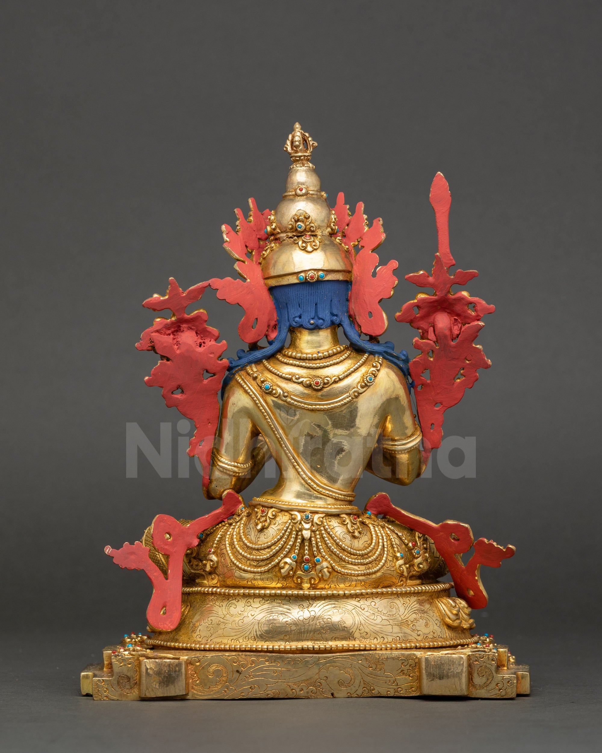 Back view of Manjushree Altar Sculpture showing detailed robe, lotus base, and gold fire-gilded carvings