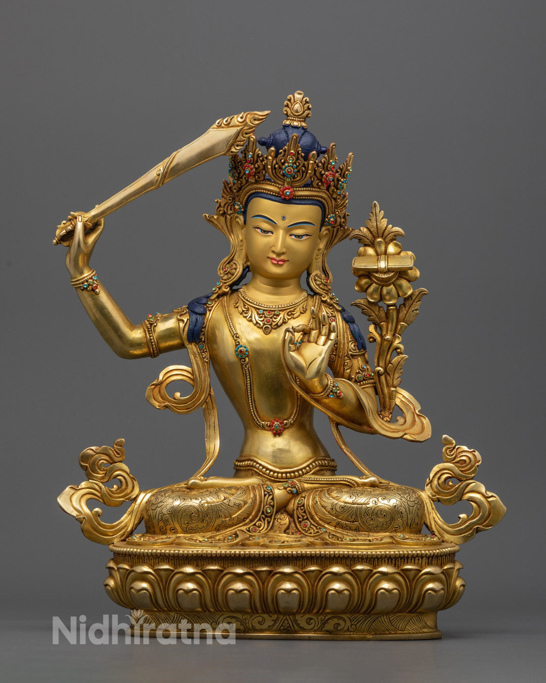 Manjushree Gold Statue, the Bodhisattva of Wisdom and Knowledge, crafted in gold, symbolizing clarity, spiritual insight, and enlightenment.