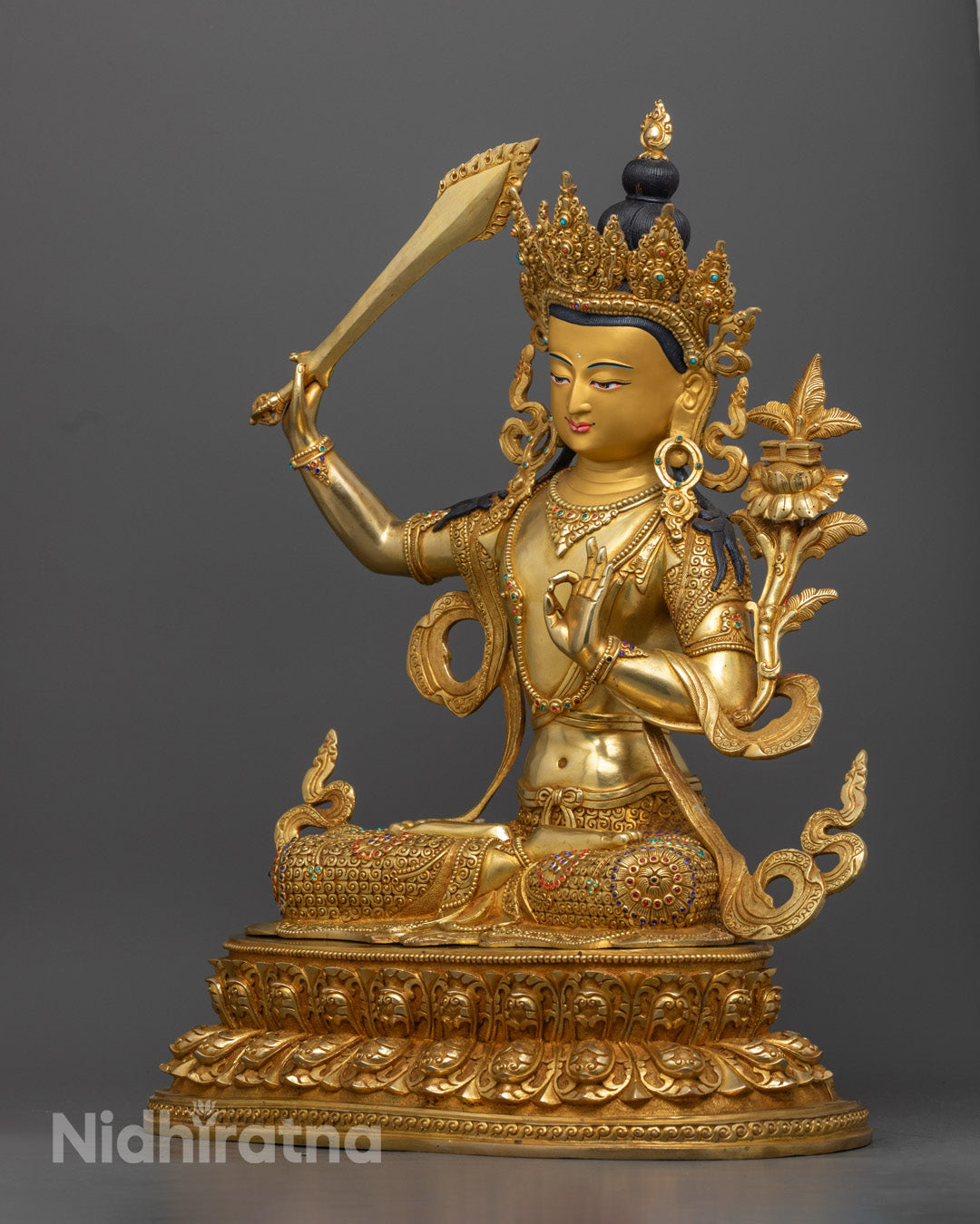 Authentic Buddhist Manjushri deity statue with intricate detailing, seated on a lotus throne – sacred home decor.