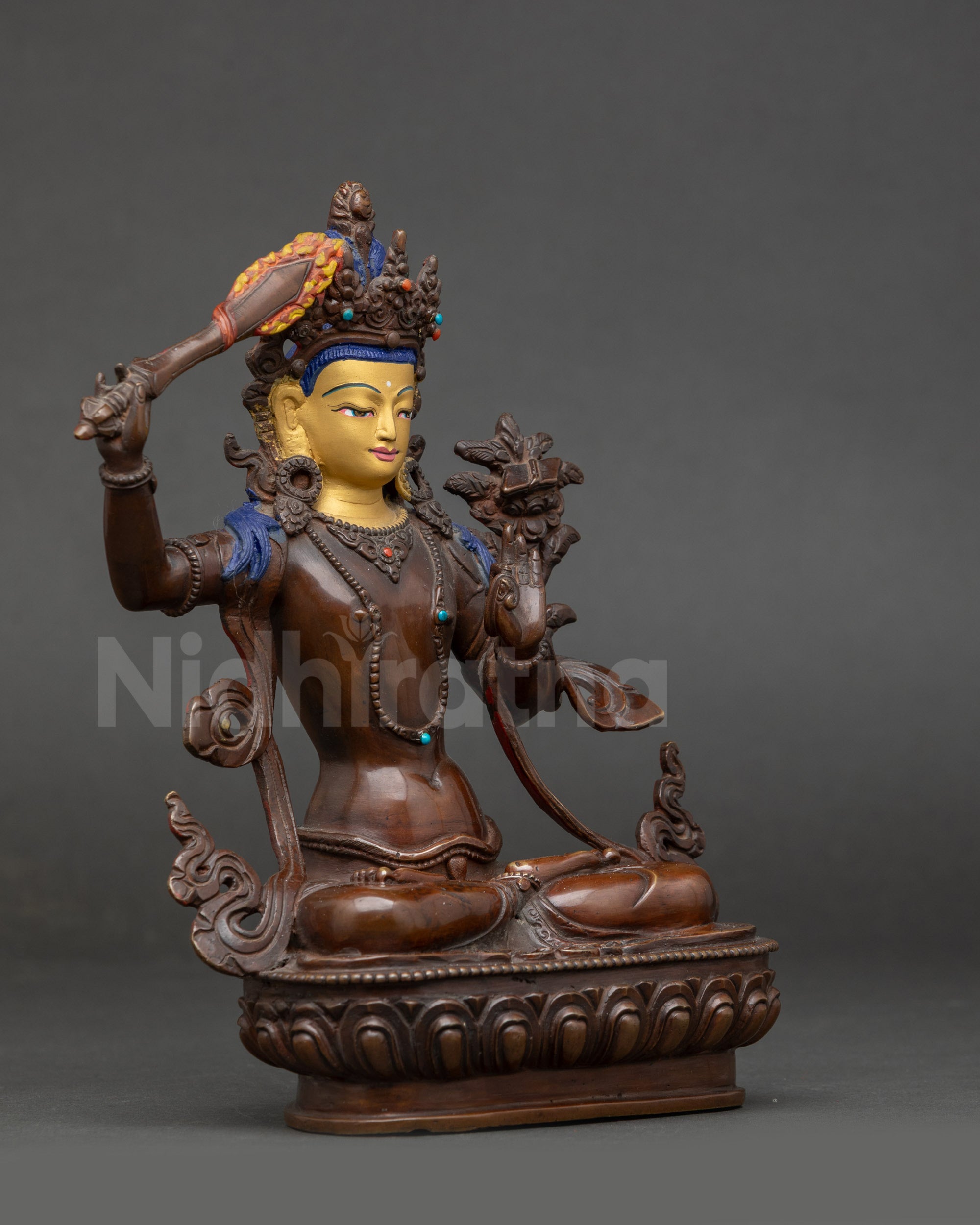 Manjushri Statue oxidized copper wisdom sword right view side